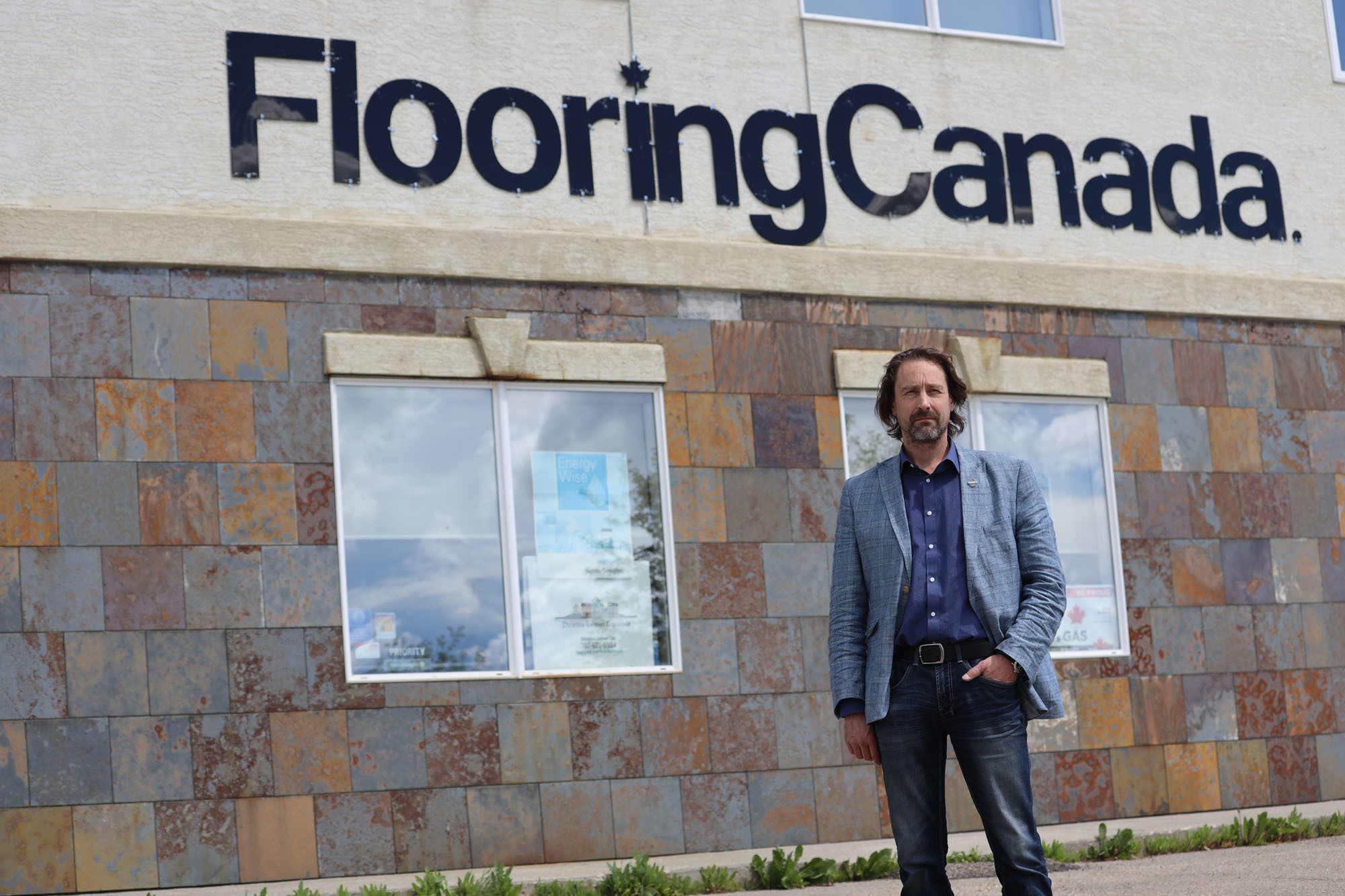 Douglas Galavan has operated his flooring business in Drayton Valley for 30 years. (Kory Siegers/CBC) 