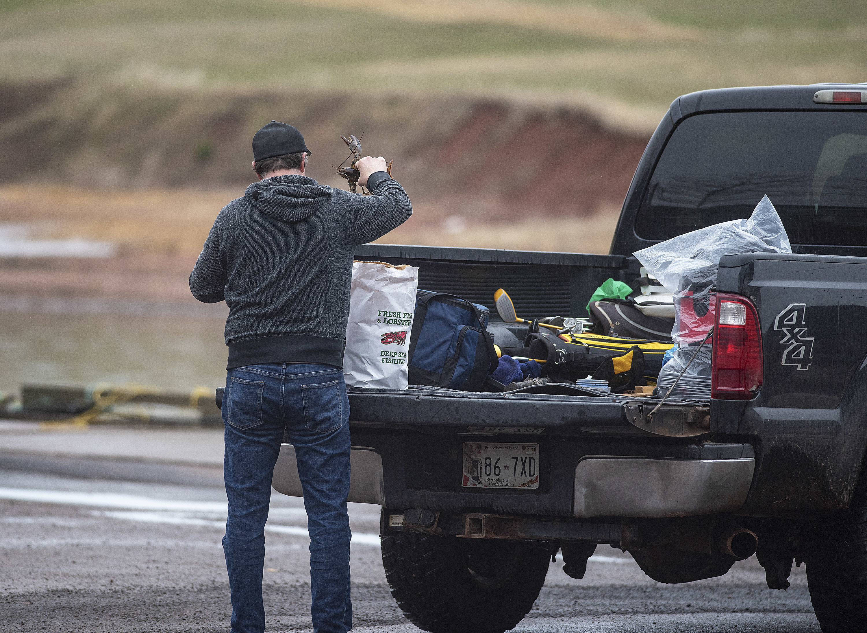 This was the first person to arrive at the French River Fisheries to buy lobster fresh off the boat. As the morning turned into early afternoon, there was a steady stream of lobster lovers arriving to buy. As one person said, ‘It can’t get any fresher than this.’ (Brian McInnis)