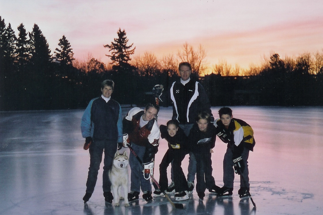 The young Gregg family at Victoria Oval in Edmonton, with their family dog Kolya. (Supplied by Kathy Gregg)