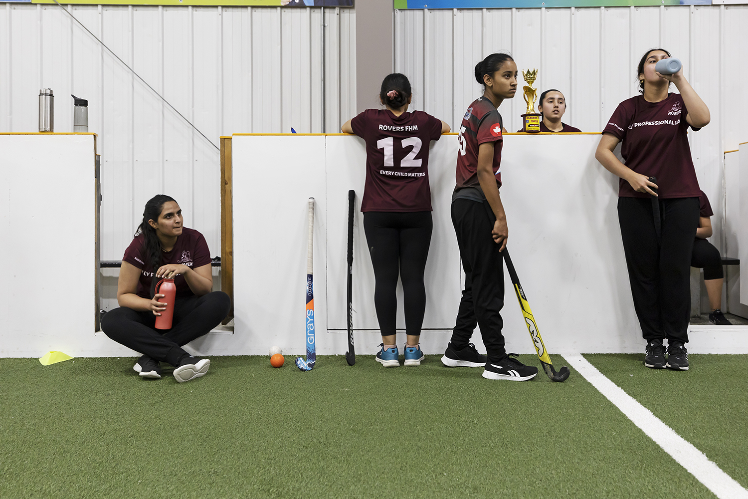 Players from the girls team rest after a hard practice session at the Gateway Recreation Centre in Winnipeg.