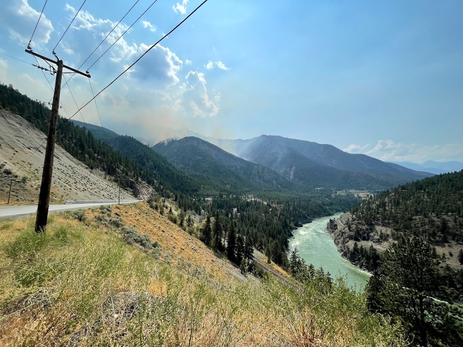 Smoke from the Lytton Creek wildfire can be seen north of the village on July 9, 2021. (Bethany Lindsay/CBC News)