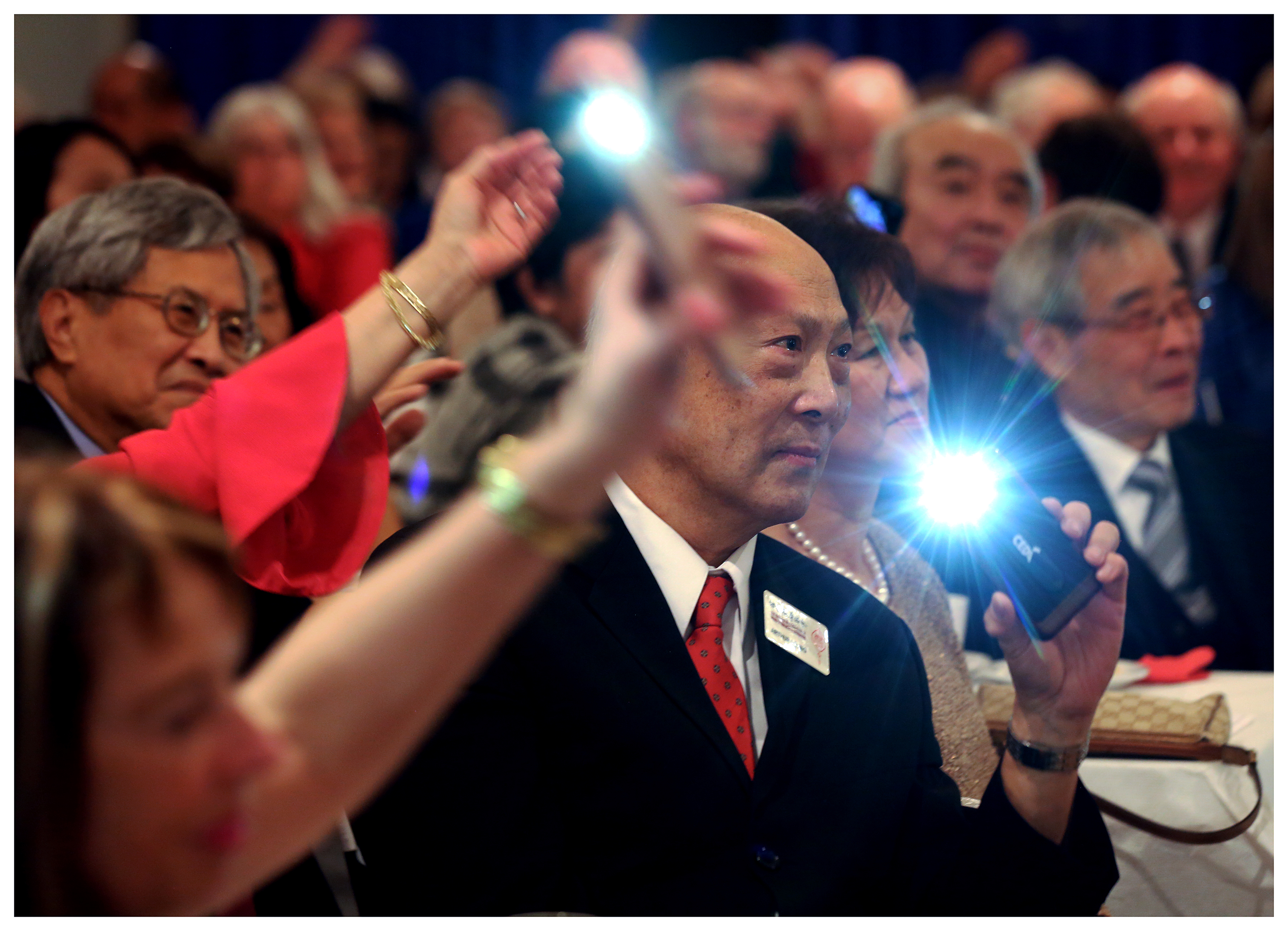 Arthur Leung, who chairs the Chinese Association of Newfoundland and Labrador's scholarship fund, enjoys the performances. 