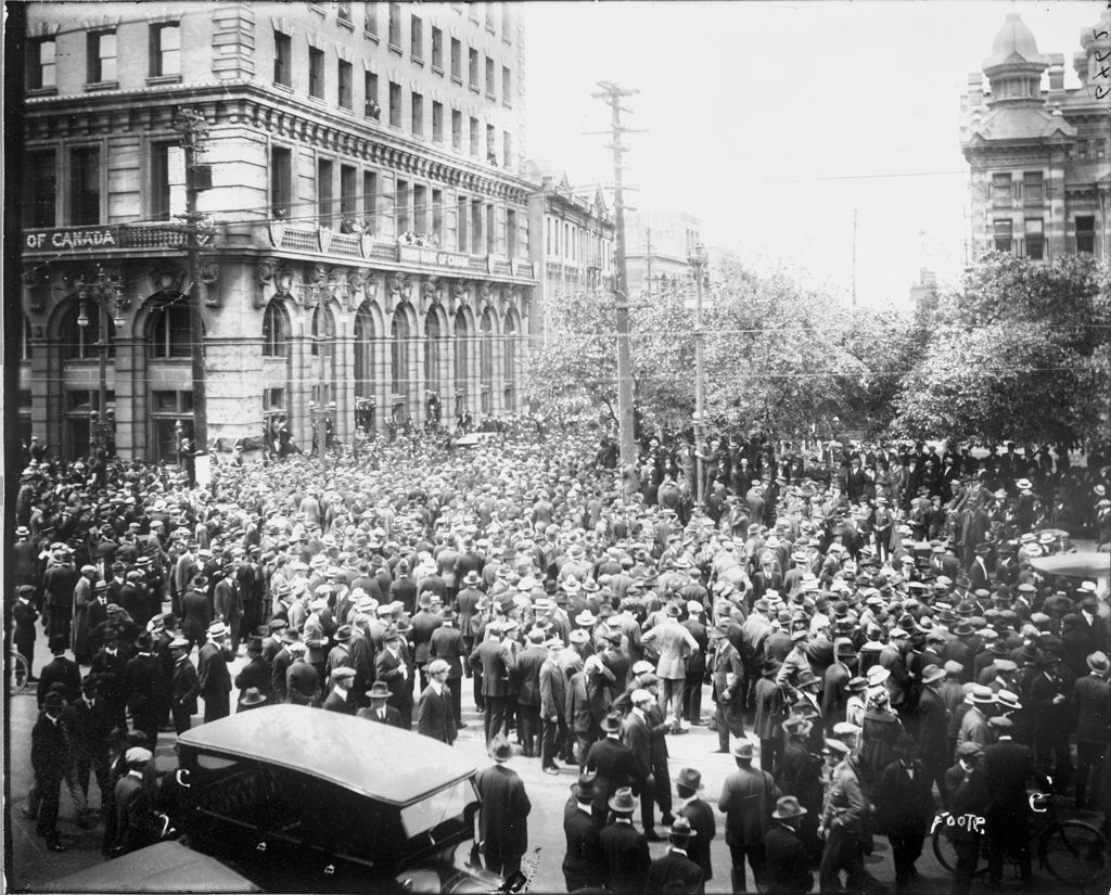 A crowd of about 6,000 stands outside of city hall, near the corner of William Avenue and Main Street, on June 21, 1919. (L.B. Foote Collection/Archives of Manitoba)