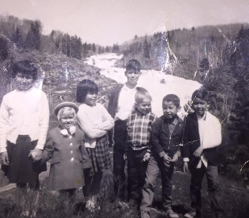 Francis Simon, in the back row, with his siblings and step-siblings, when he went to live with his father in northern Ontario. (Submitted by Francis Simon)