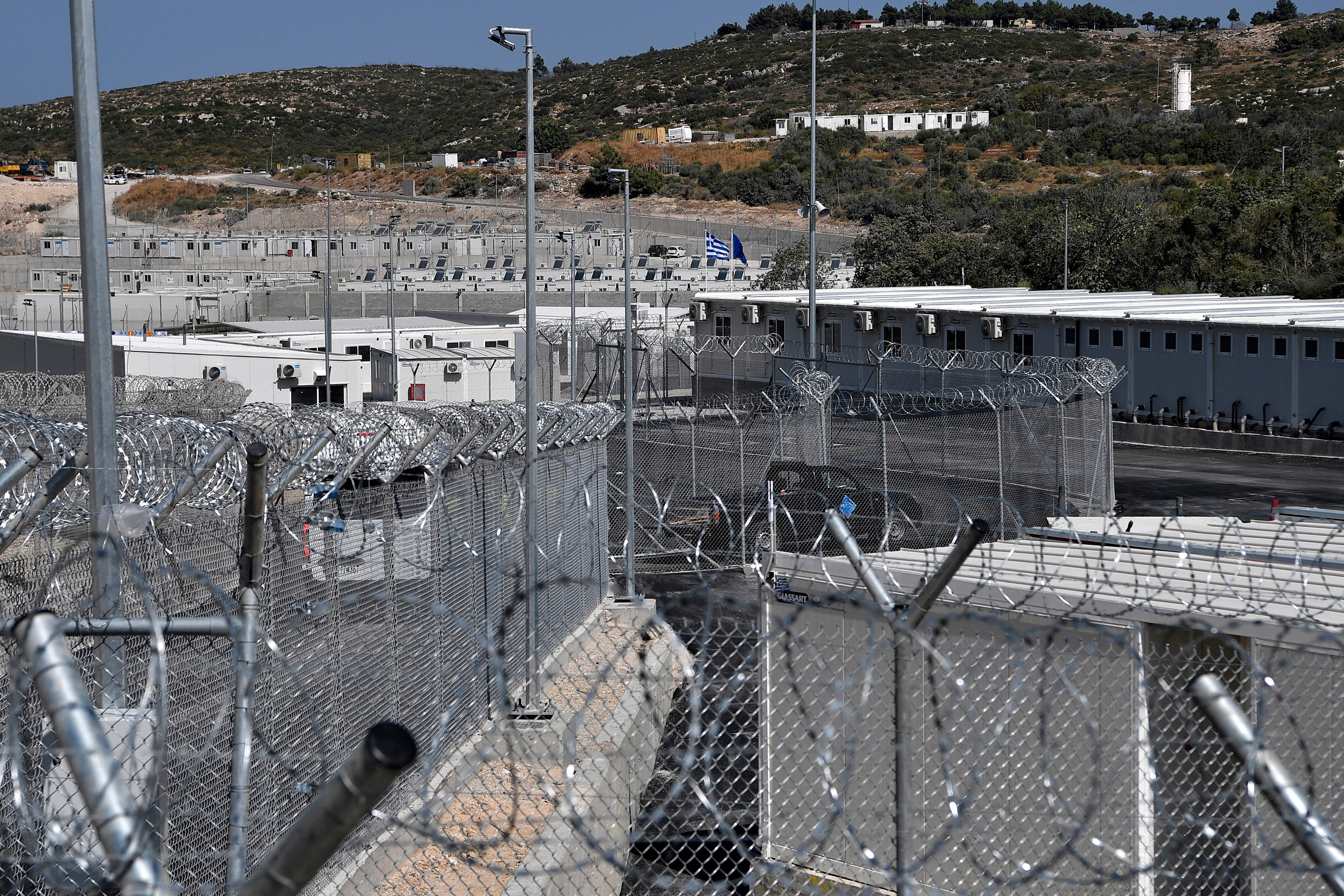 The EU-funded camp for migrants on the island of Samos is one of five new camps on Greek islands in the Aegean that receive most of the migrant arrivals by sea from neighbouring Turkey. (Louisa Gouliamaki/AFP/Getty Images)                  