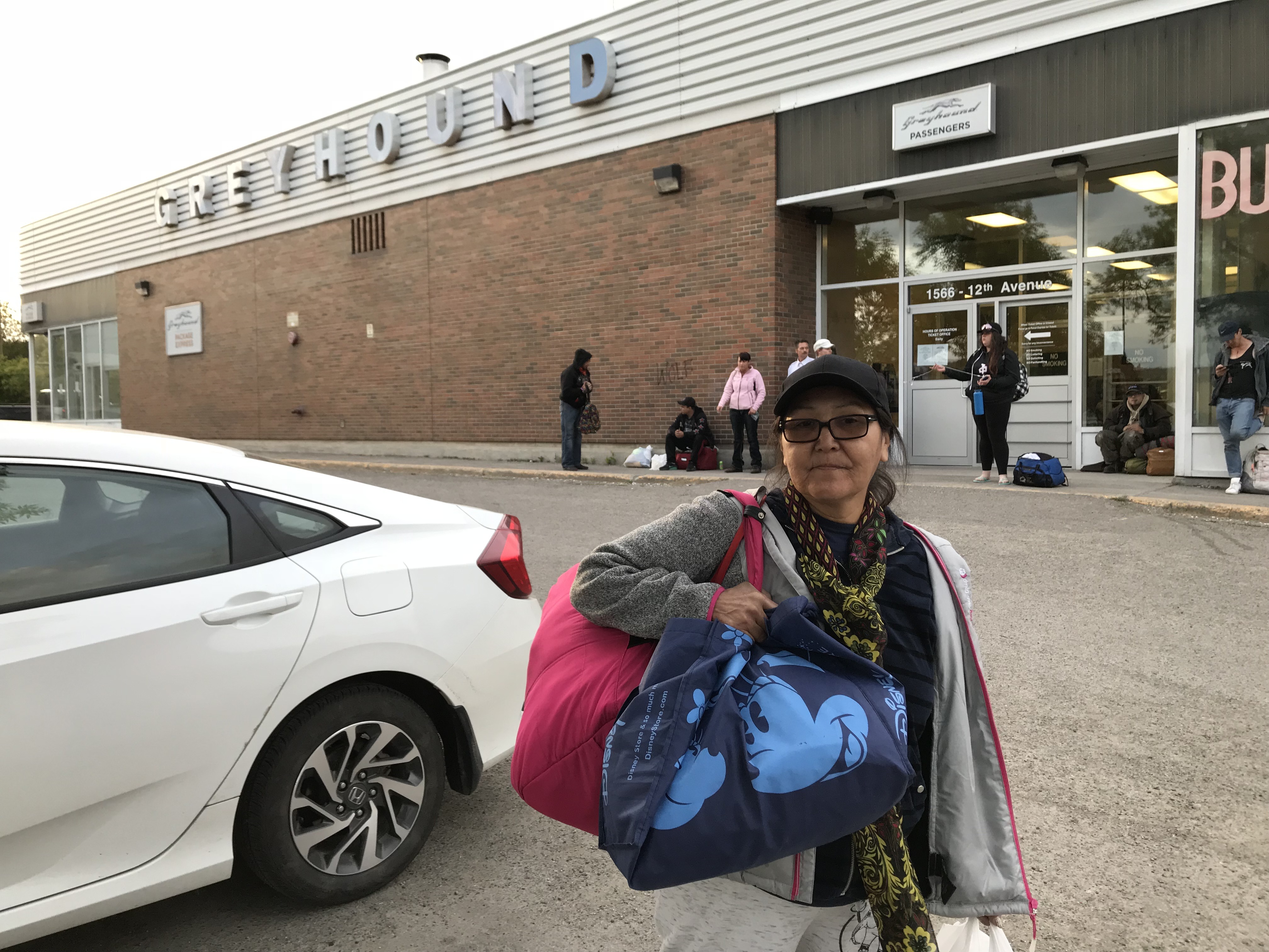 Myrtle Patrick, 57, waits for her connecting bus to Vanderhoof where she's planning to attend the funeral of her niece. Patrick says she would be willing to hitchhike if she had to. (Audrey McKinnon)