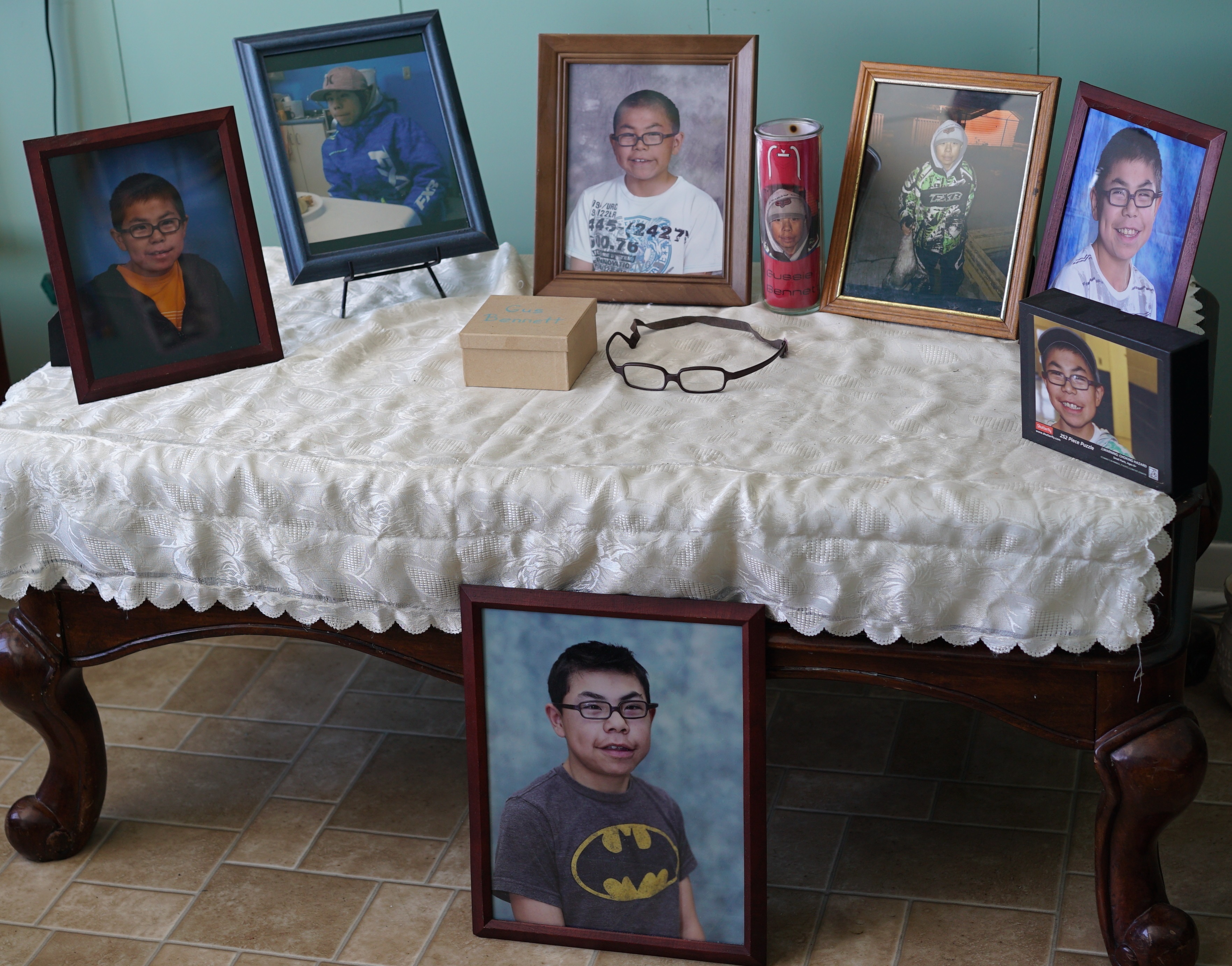 Photos of Gussie Bennett in his family's home in Nain. (Ossie Michelin/CBC)