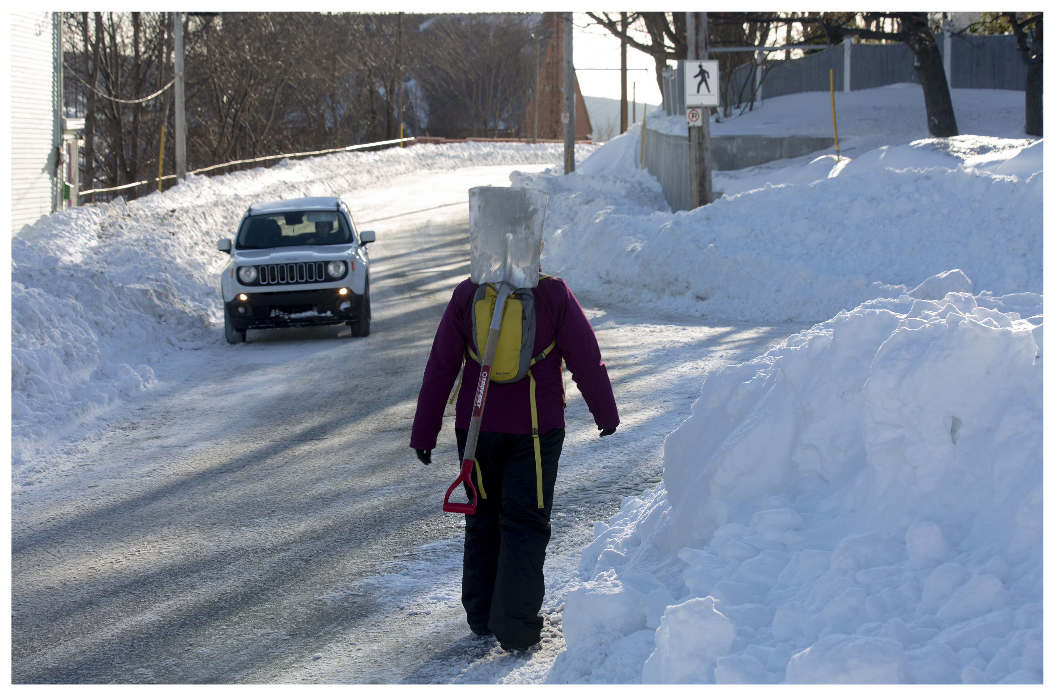 On Sunday afternoon, Harvey Road in St. John’s was barely wide enough for two vehicles. Folks were walking, often with shovels to dig out family and friends. Photo by Paul Daly