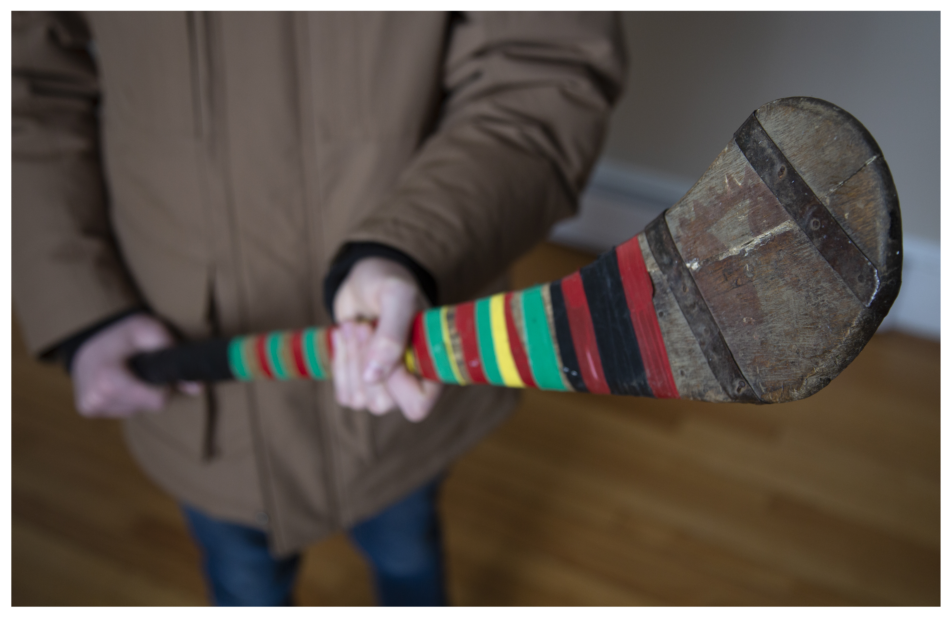 A hurling stick. The sports remains quite popular to this day in Ireland; could there be a connection to hockey? 