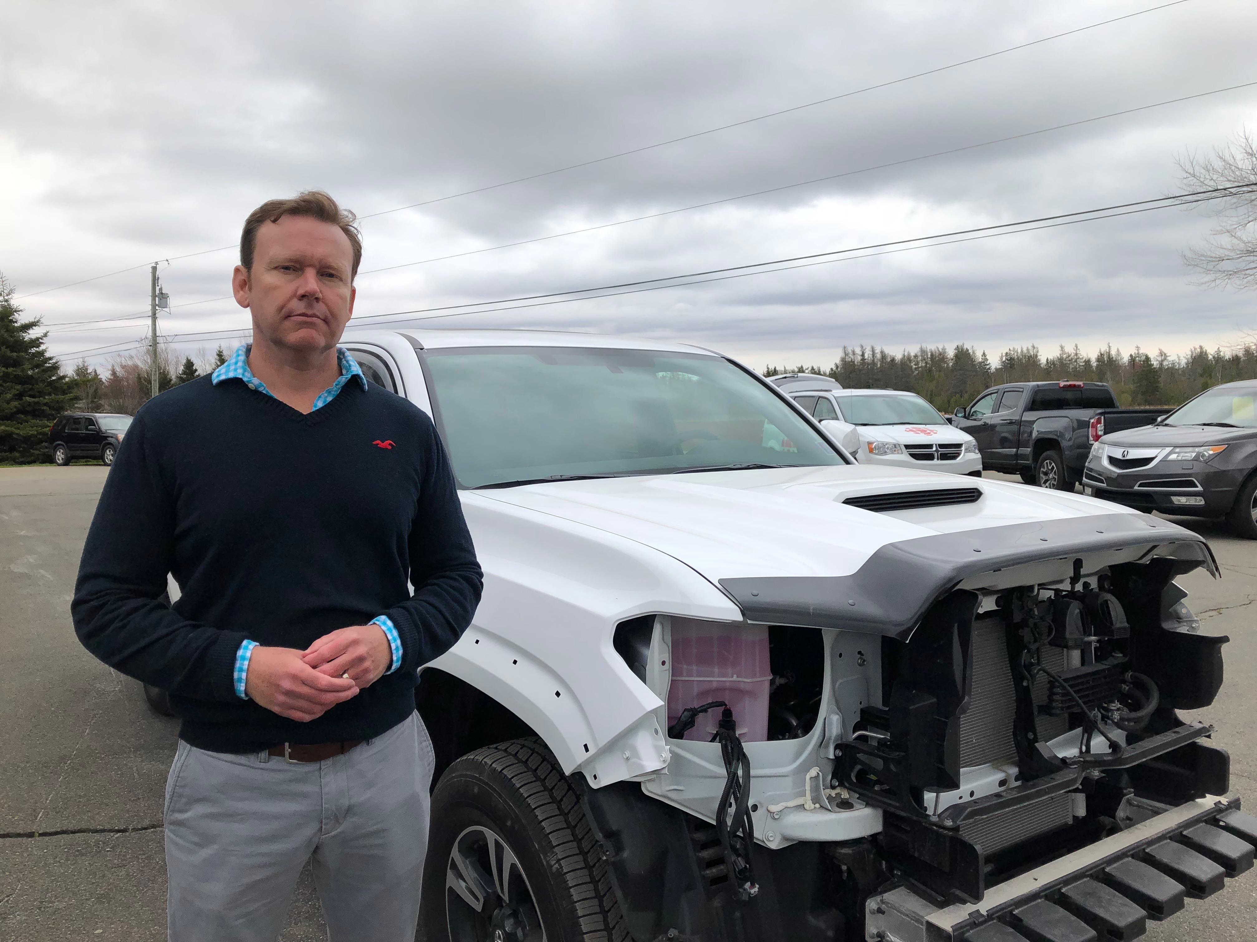 Sam Dalton's new Toyota Tacoma sustained $9,200 in damage. (Sally Pitt/CBC)