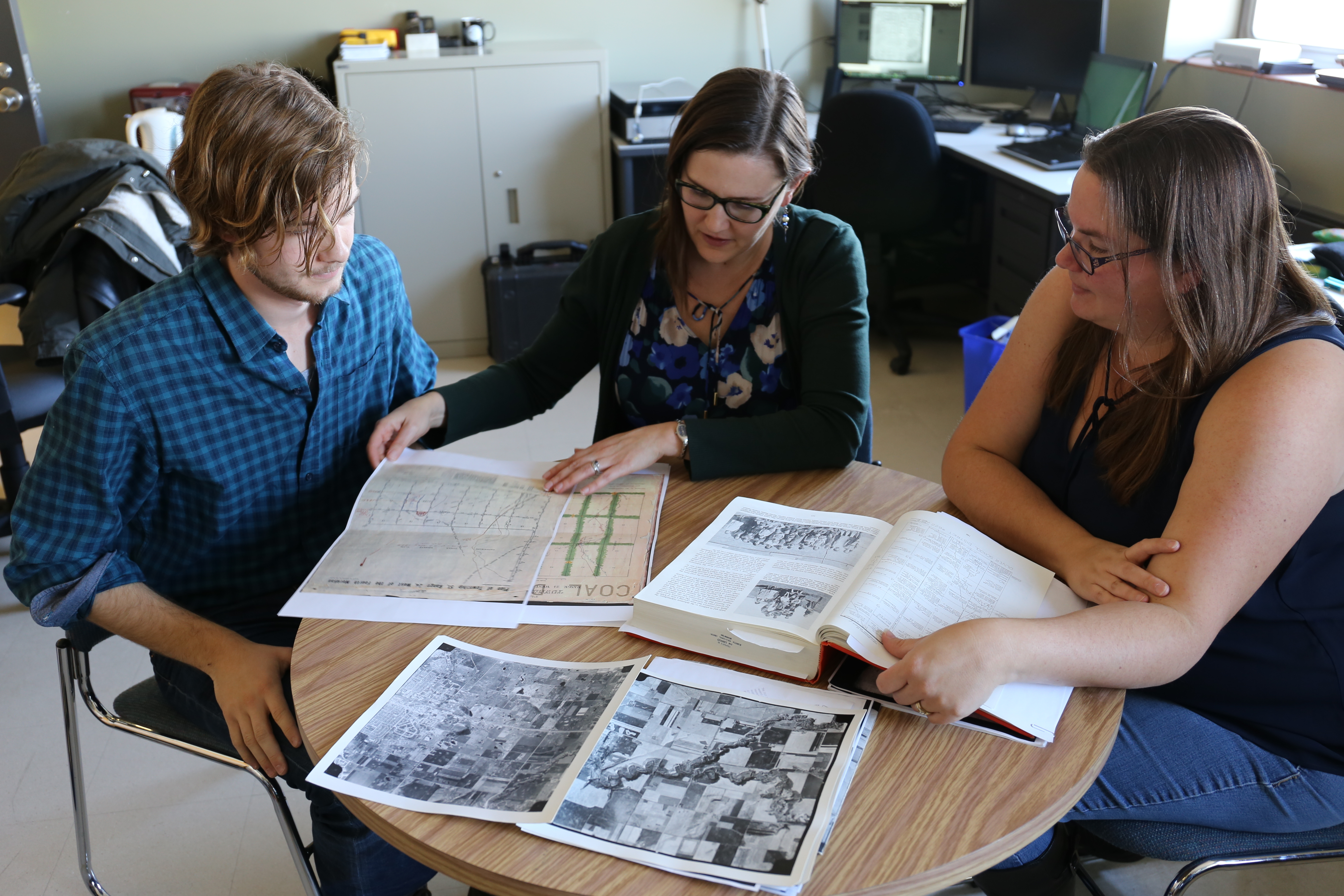 Kisha Supernant, centre, is working with University of Alberta students William Wadsworth, left, and Kathy Gadd, right, to find Papaschase burial sites. (Stephanie Dubois/CBC)