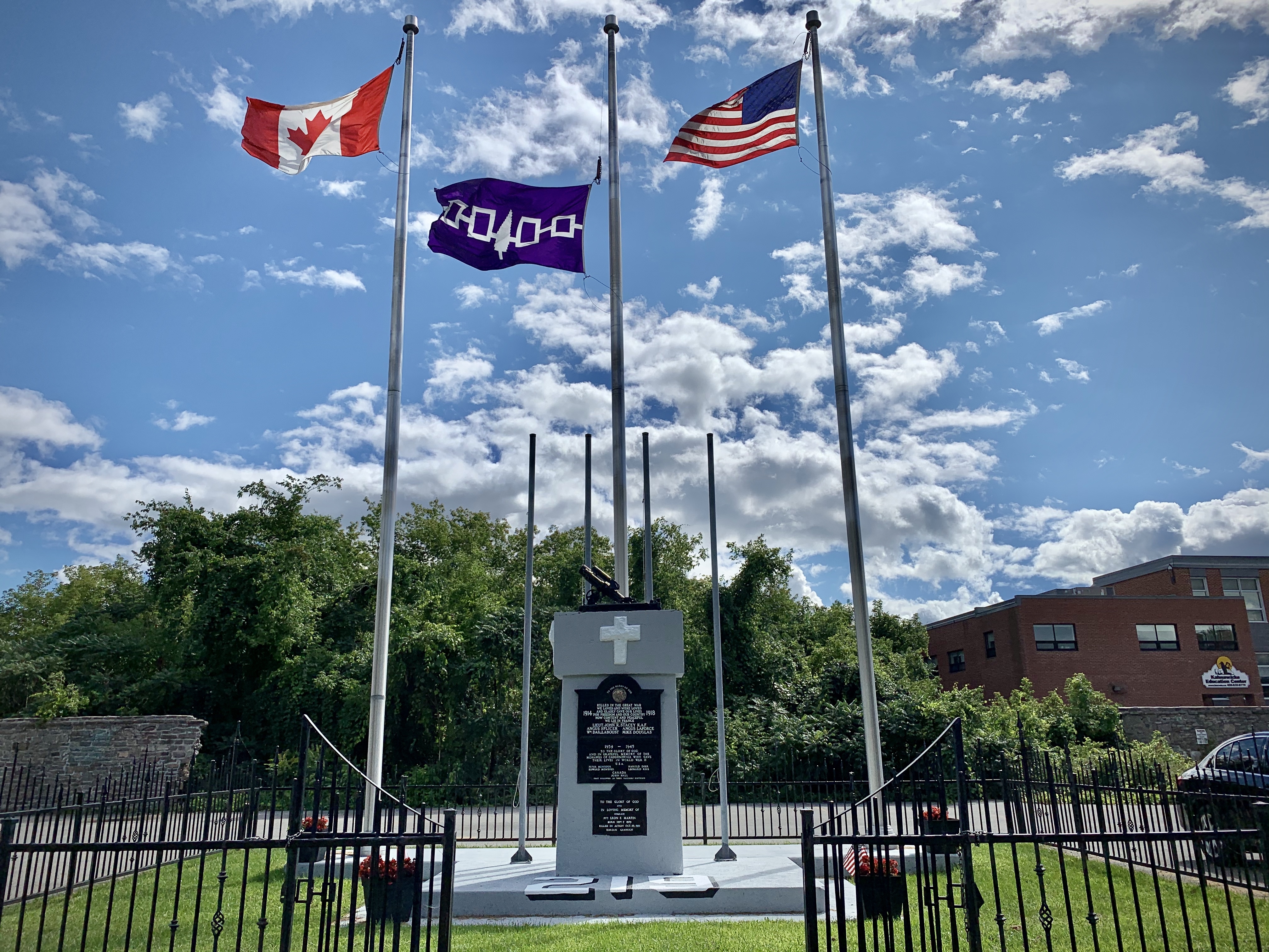 This cenotaph in Kahnawake, Que. honours Kanien'kehà:ka men and women who lost their lives in the First World War, Second World War, and Korean Campaign. (Jessica Deer/CBC News)