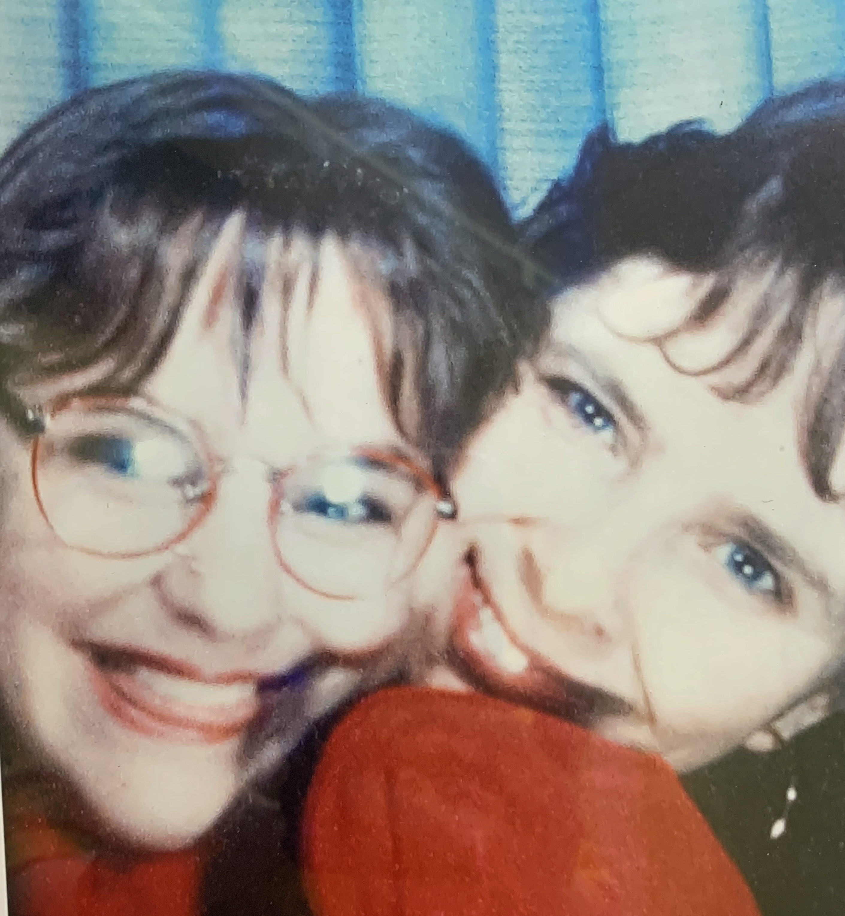 Lauralee sits on her mom Brenda's lap in the photo booth at the Avalon Mall in St. John's. (Submitted by Lauralee Gillingham)