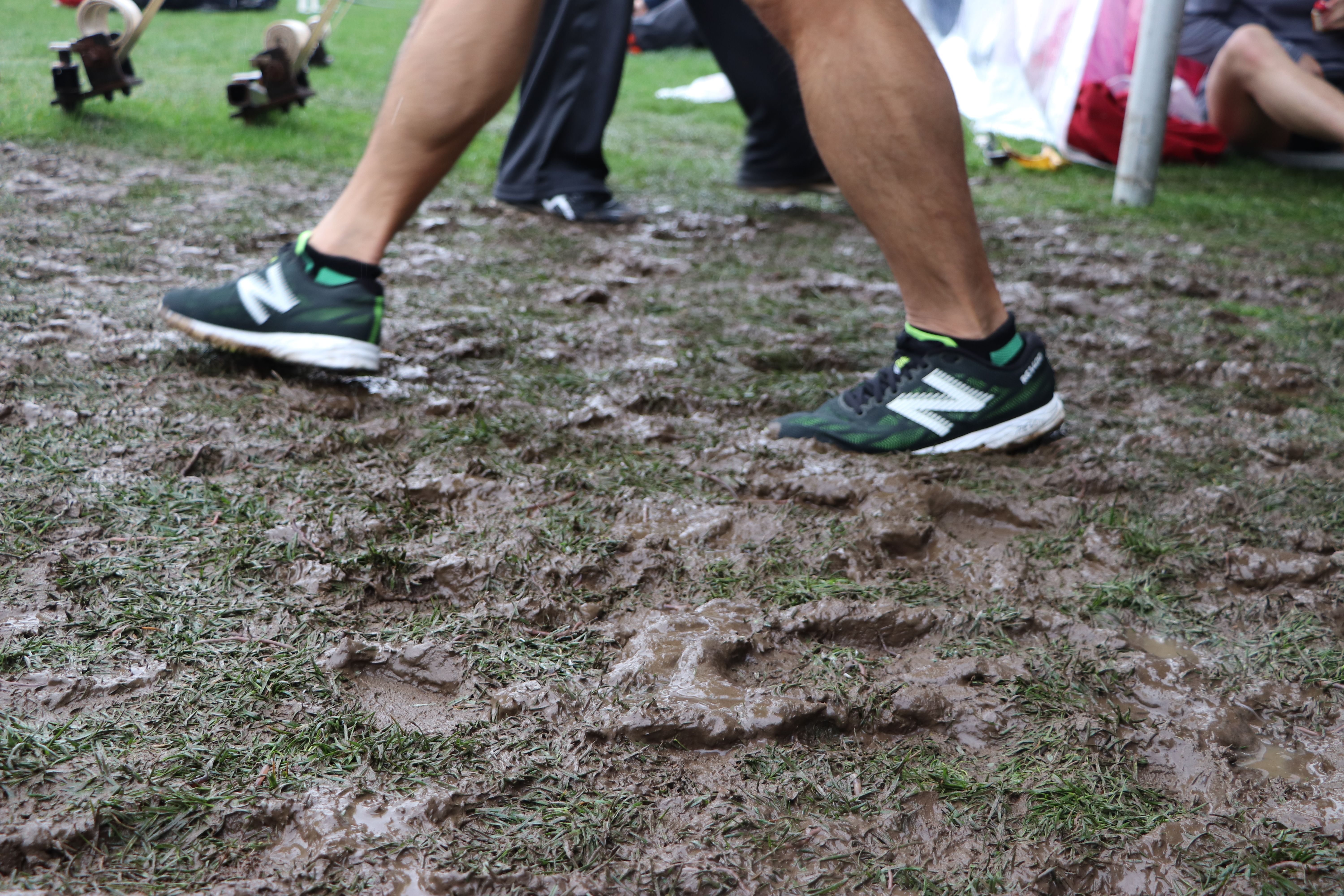 The heavy rain that fell over the Boston area on the morning of the marathon created muddy, slippery conditions for runners waiting at the athletes’ village. (Julia Page/CBC)