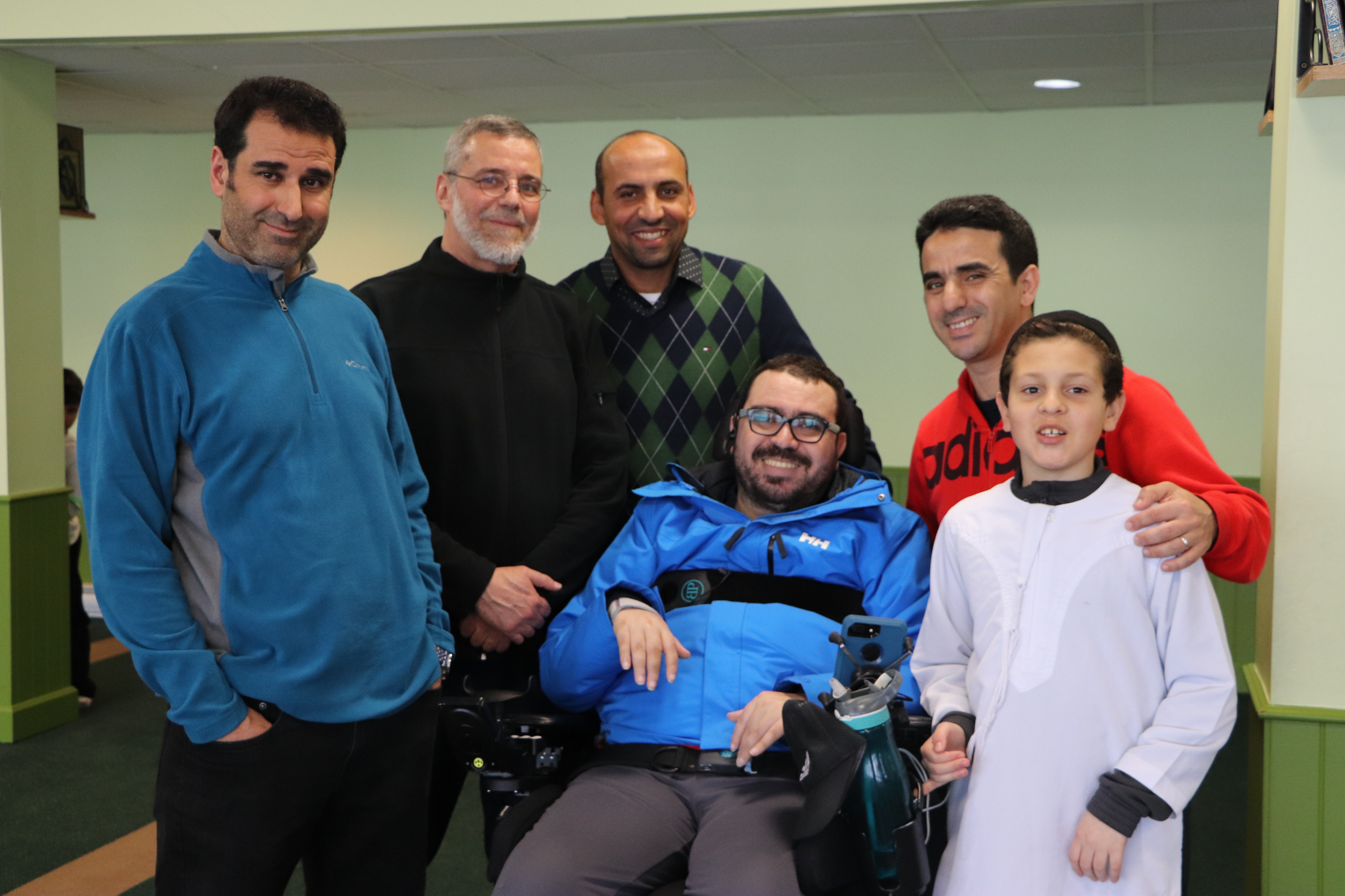 The group was reunited with Aymen Derbali, who has been paraplegic since the shooting, on the Friday following the marathon. Hakim told Derbali they thought of him during their entire trip. (Julia Page/CBC)