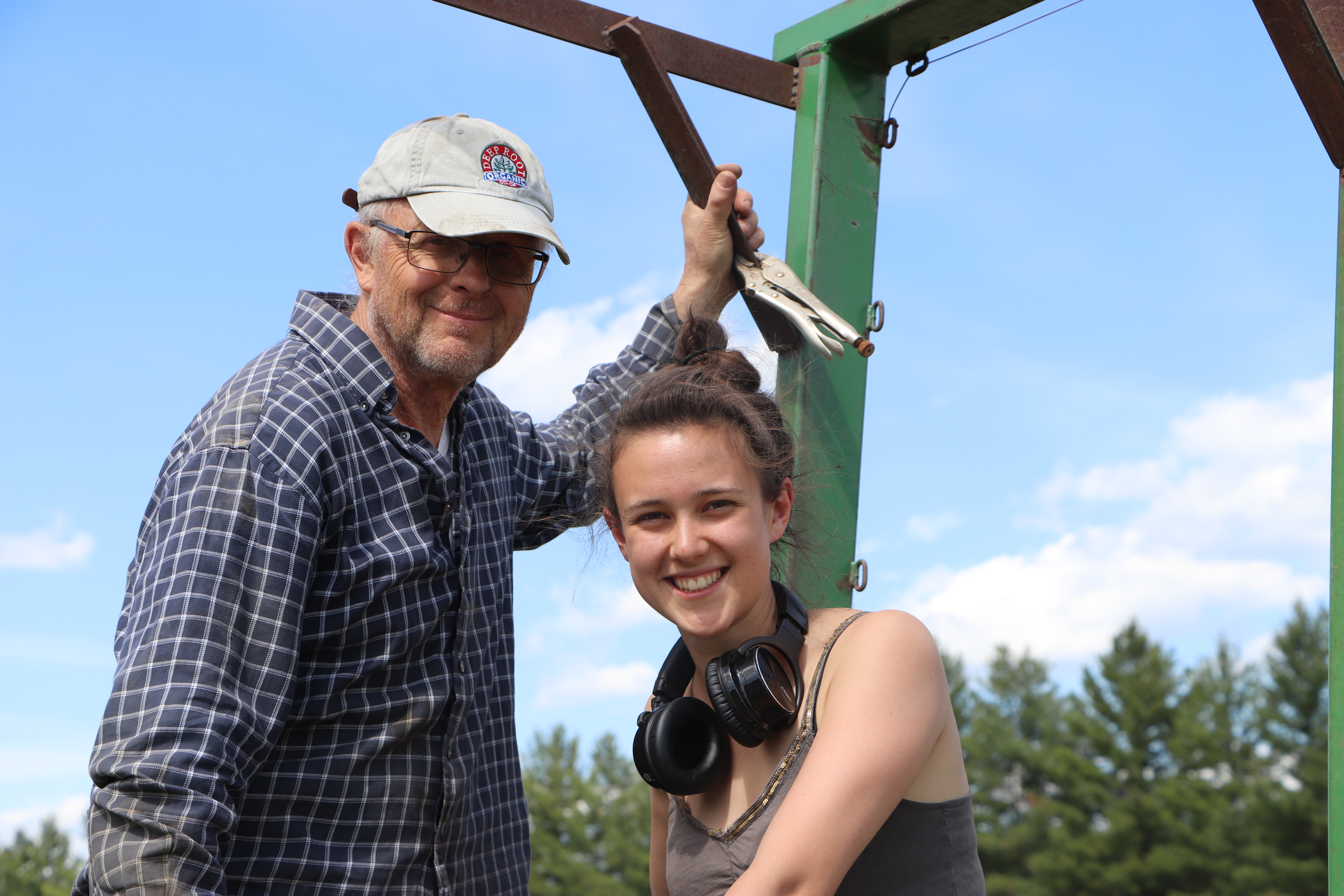 Aimée’s sister Camille, pictured here with their father, Russell Pocock, also works in the fields in the summer. She is pursuing a degree in physical therapy. (Julia Page/CBC)