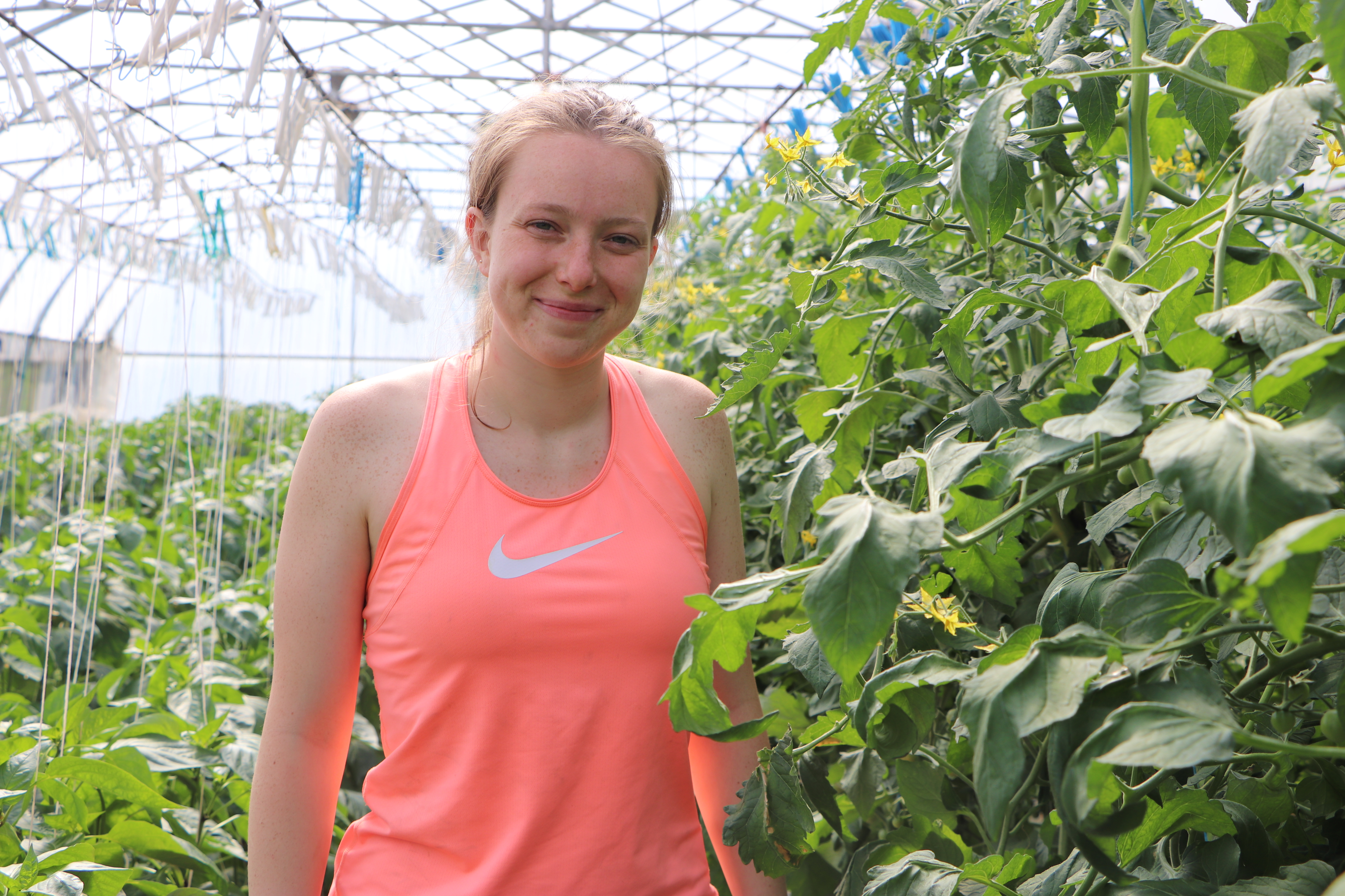 Aimée Pocock has been spending most of her time learning the ropes on how to care for the plants in the greenhouse and how to balance the books. (Julia Page/CBC)