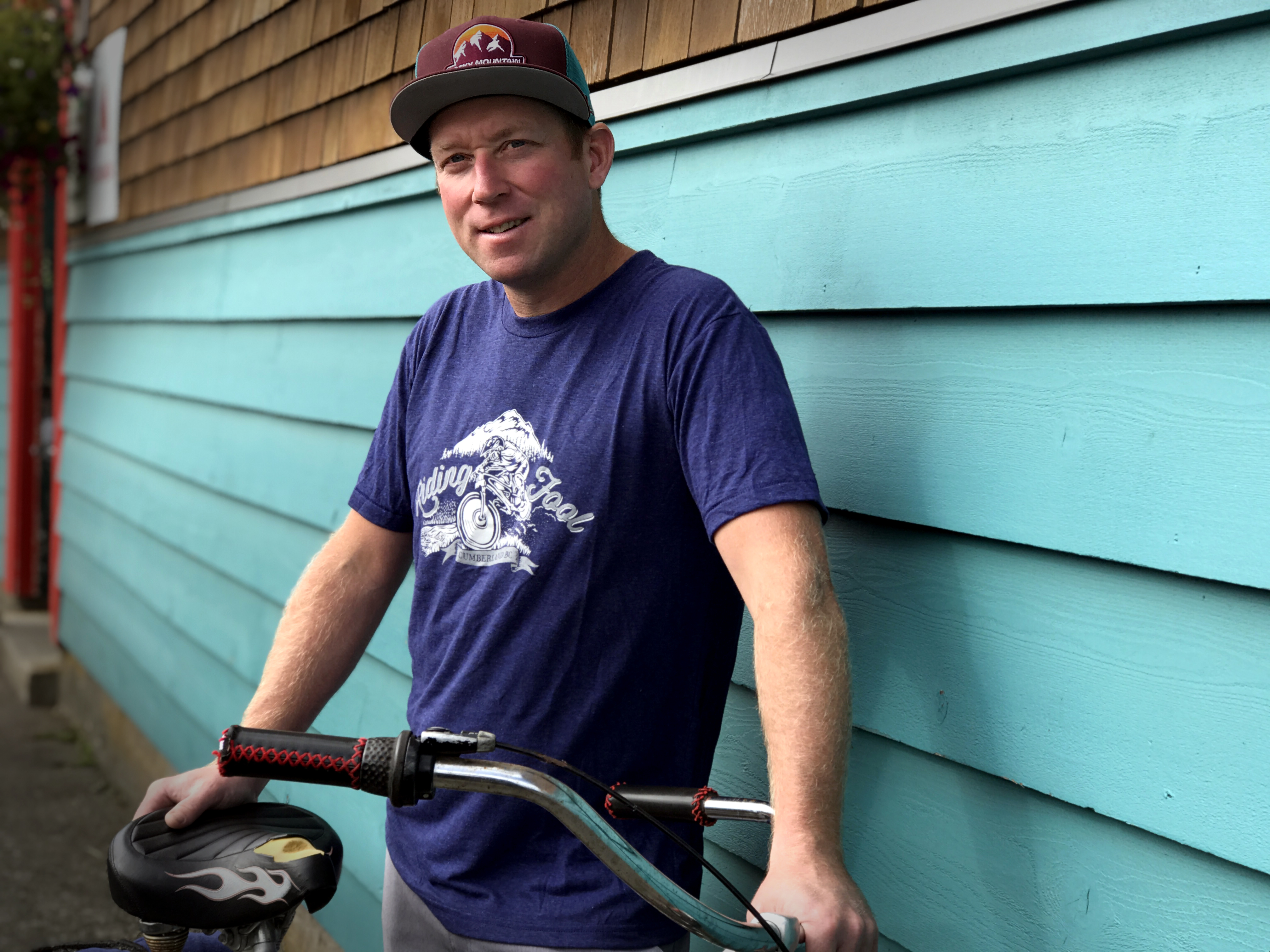 Jeremy Grasby moved to Cumberland after discovering the potential of the mountain bike trail network. Now, he runs the Riding Fool Hostel, which largely caters to mountain bikers. (Megan Thomas/CBC)