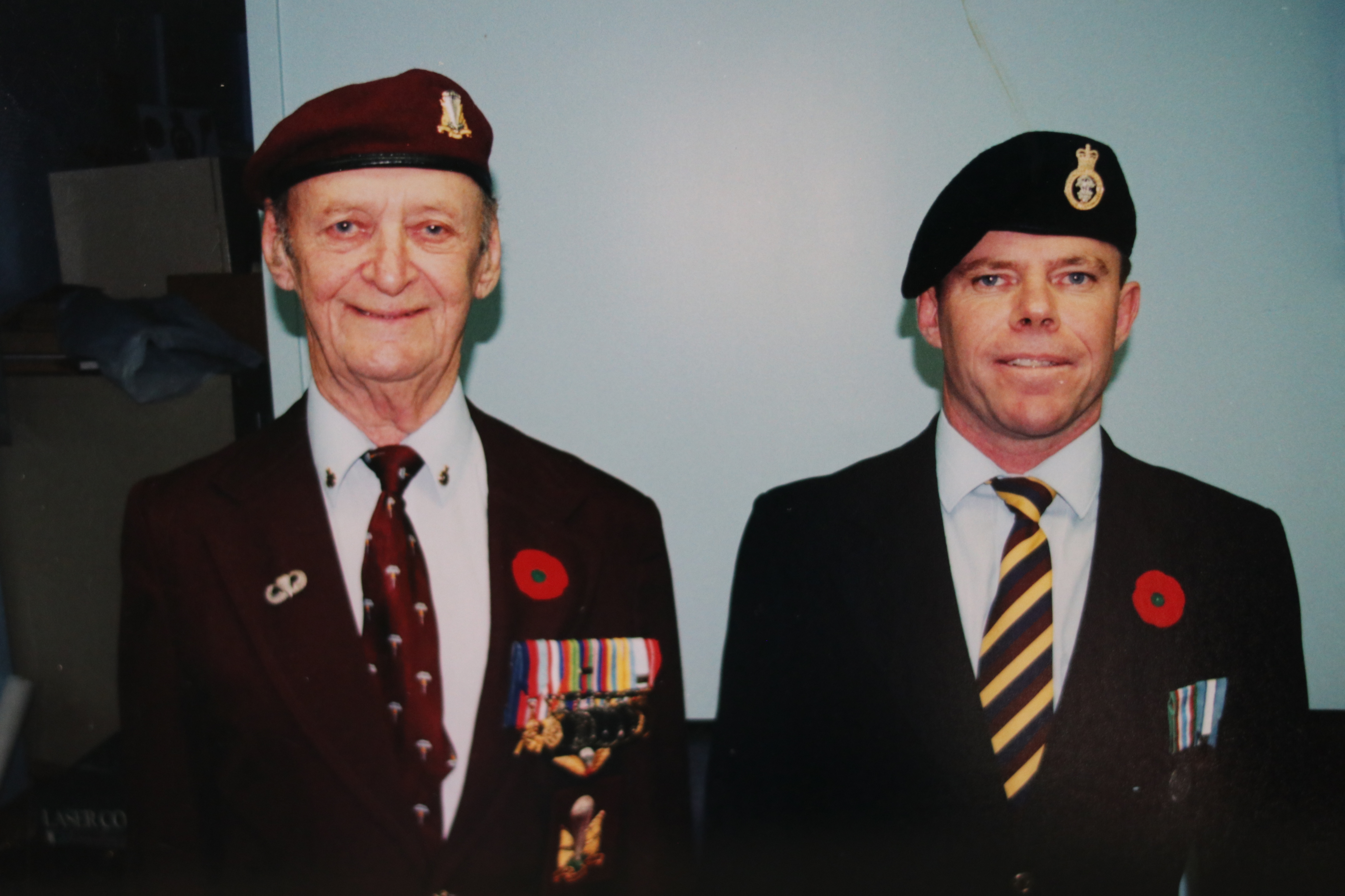 Rushton, left, with his son, Robert in 1988. Two of the Rushtons' children joined the military.