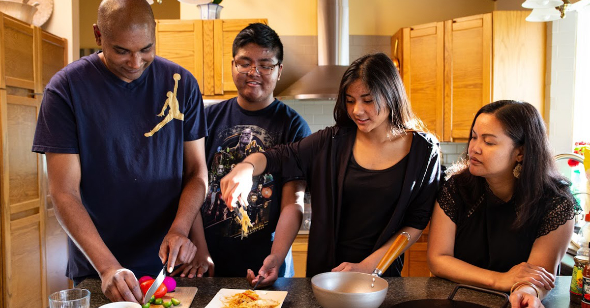 Cooking up her traditional dishes and volunteering for Philippine Heritage Month events are ways Dotimas can help her children connect with their cultures. (Emily Rendell-Watson)