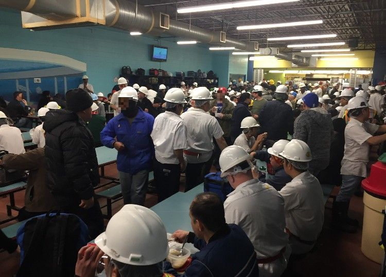 Workers gather in the cafeteria prior to the COVID-19 outbreak. After dozens of employees fell ill at Cargill, the company said it would begin staggering break times. (Submitted by name withheld)