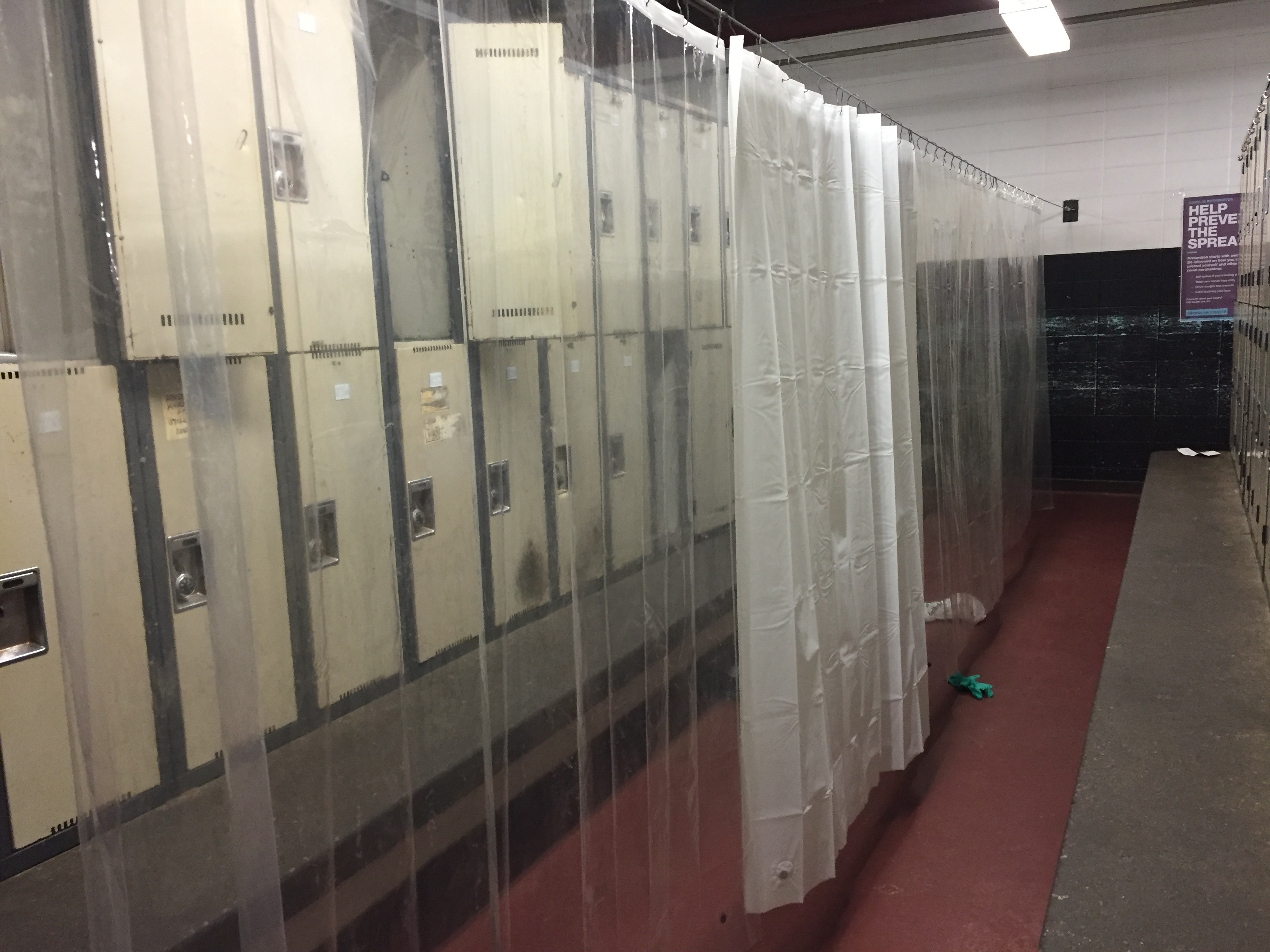 Employees say these plastic sheets were hung in the change room in mid-April, prior to the plant's closure, to minimize the spread of COVID-19. (Submitted by name withheld))