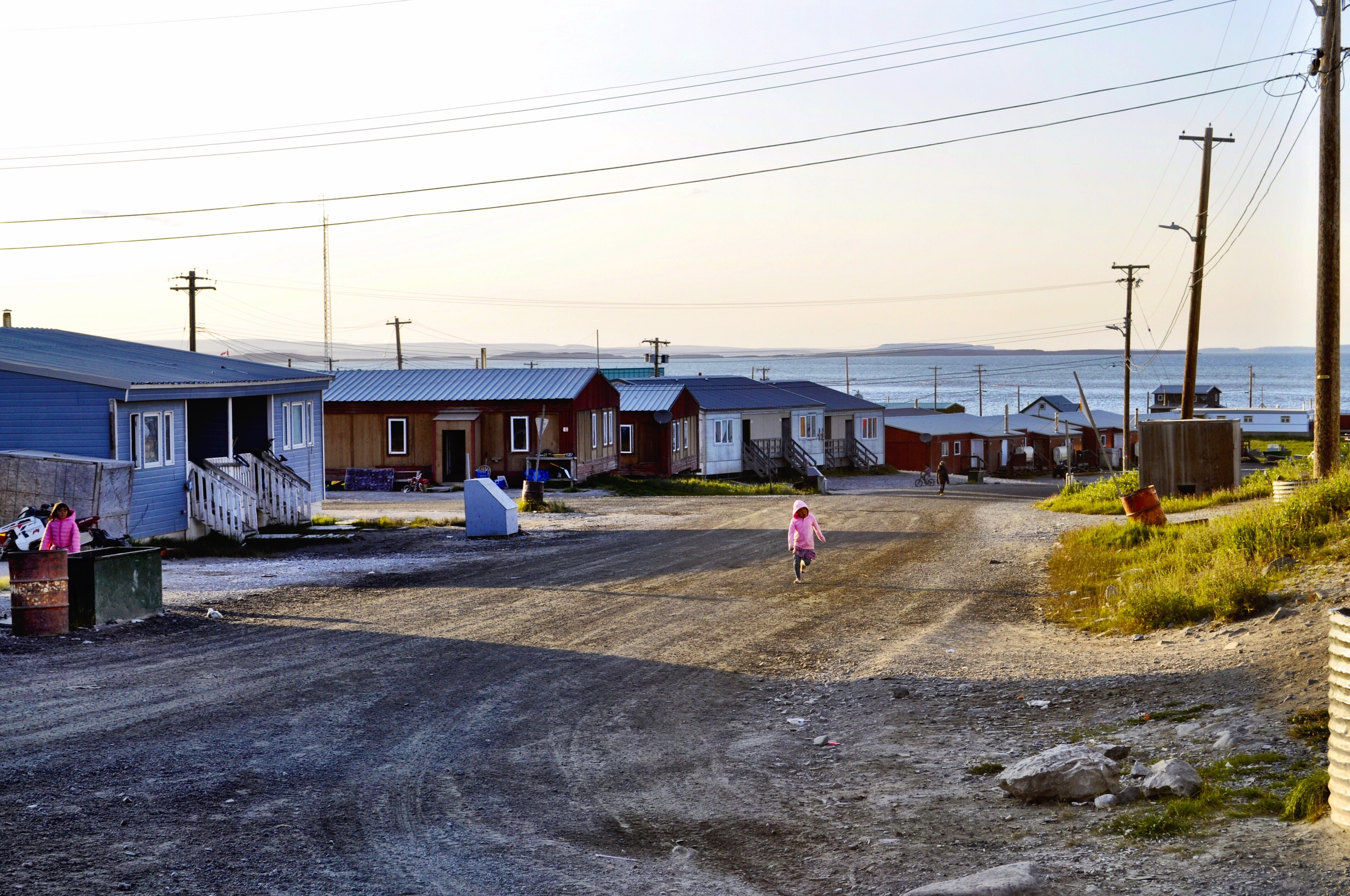 Children play on the streets of Kugluktuk. The community lies on the Arctic Ocean in western Nunavut. (Hilary Bird/CBC)