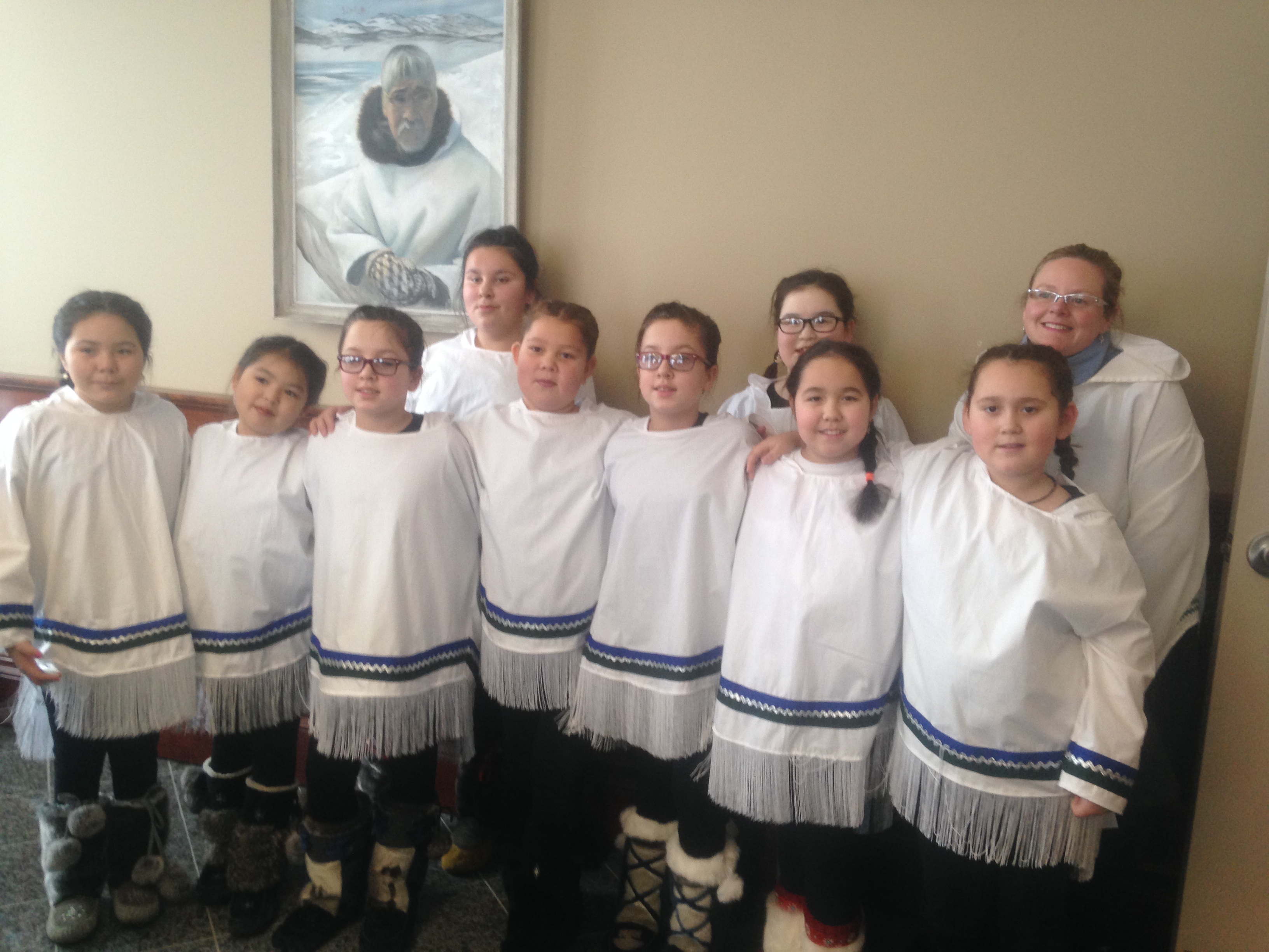 Hopedale choir: Franny Onalik, Jamie Pijogge, Kelly Flowers, Eliza Tuglavina, Grace Winters, Hayley Flowers, Abigail Tuglavina, Kennedy Winters, Laura Winters and director Nicole Shuglo. (Angela Antle/CBC)