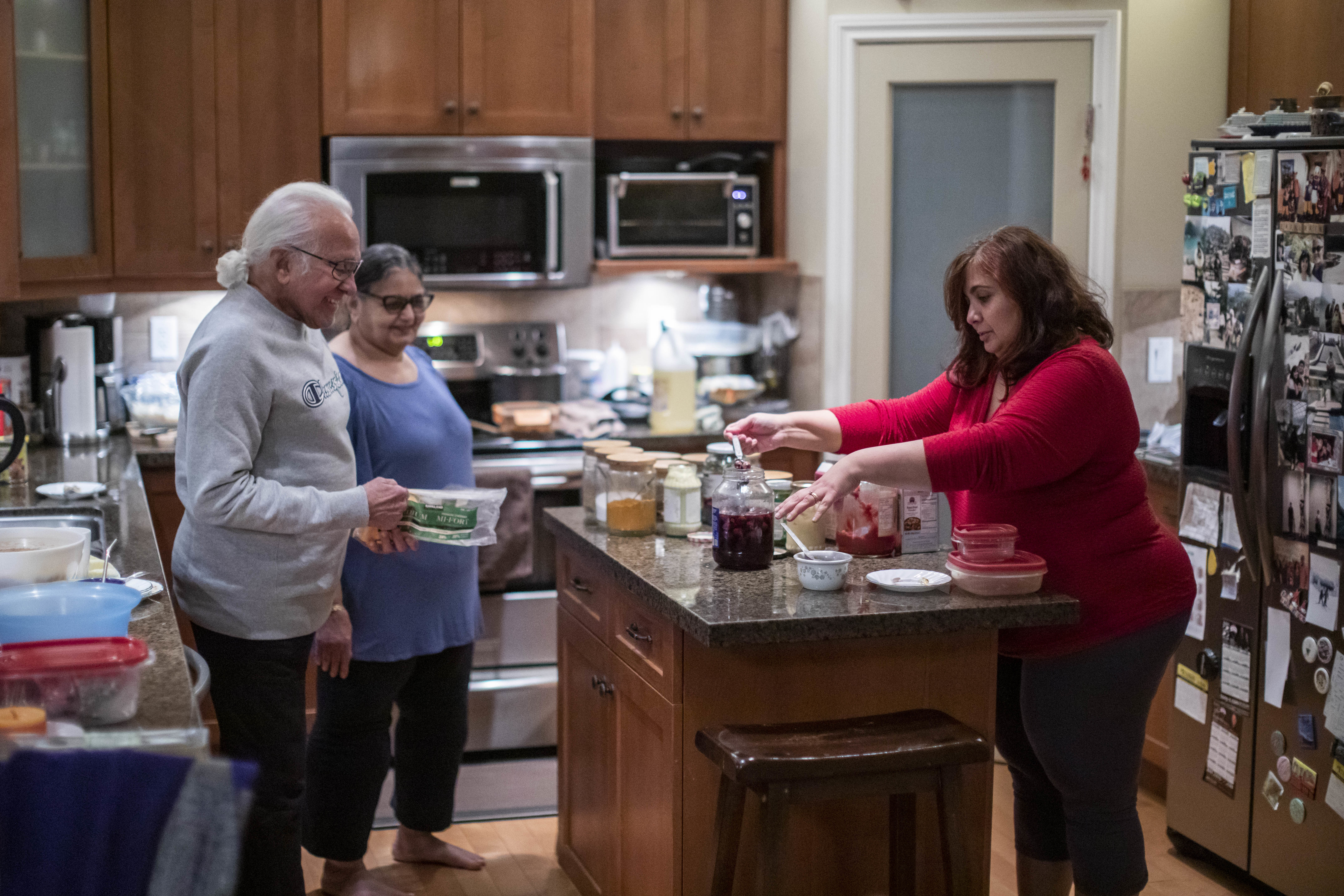 Lakhani's father-in-law and mother-in-law have their own living space in the basement. But the family regularly comes together to cook. (Ben Nelms/CBC)