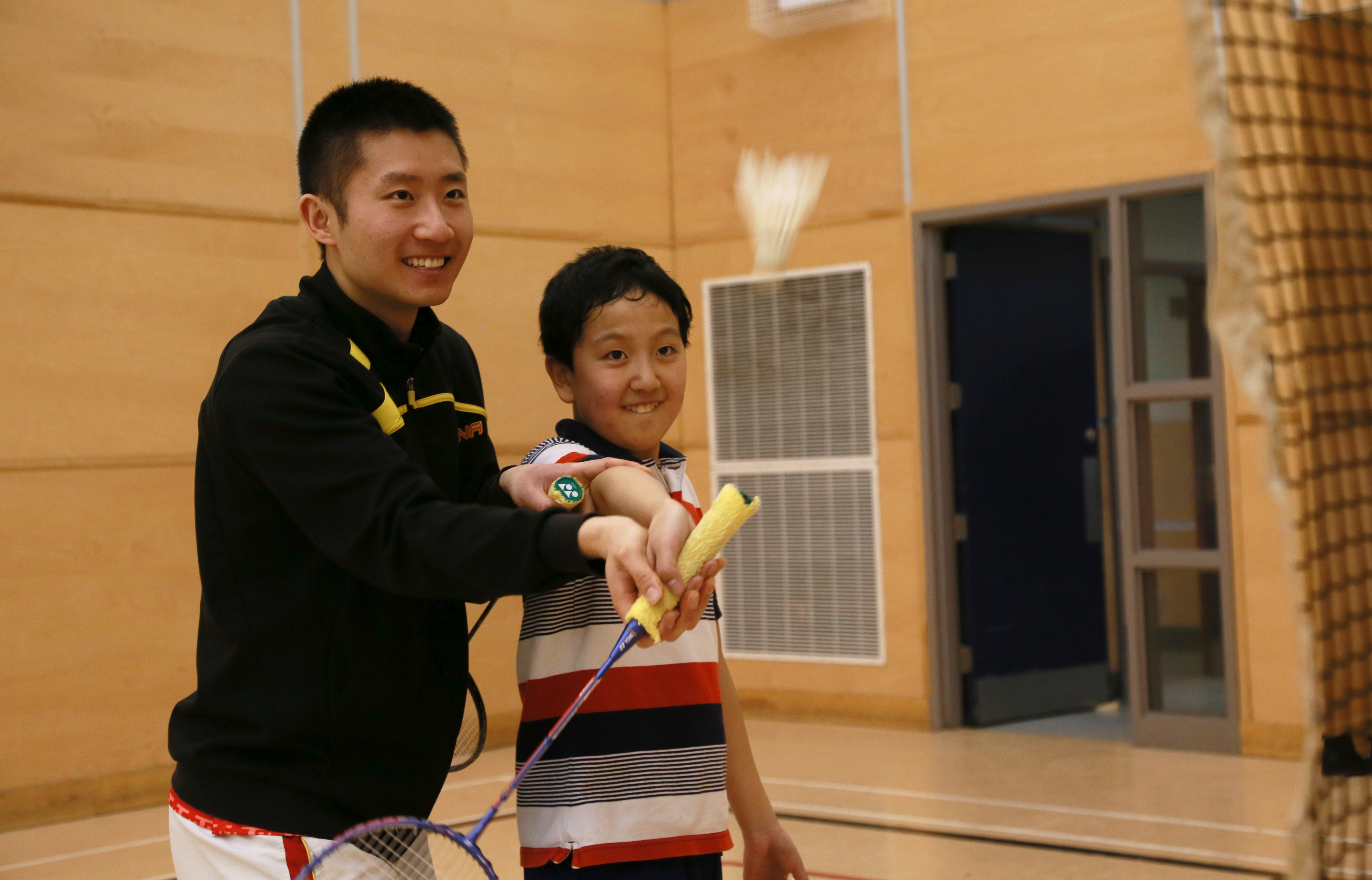 Zhang has now coached more than 500 kids in the Maritimes. Coaching badminton feels as good as playing it, he says. (María José Burgos/CBC)