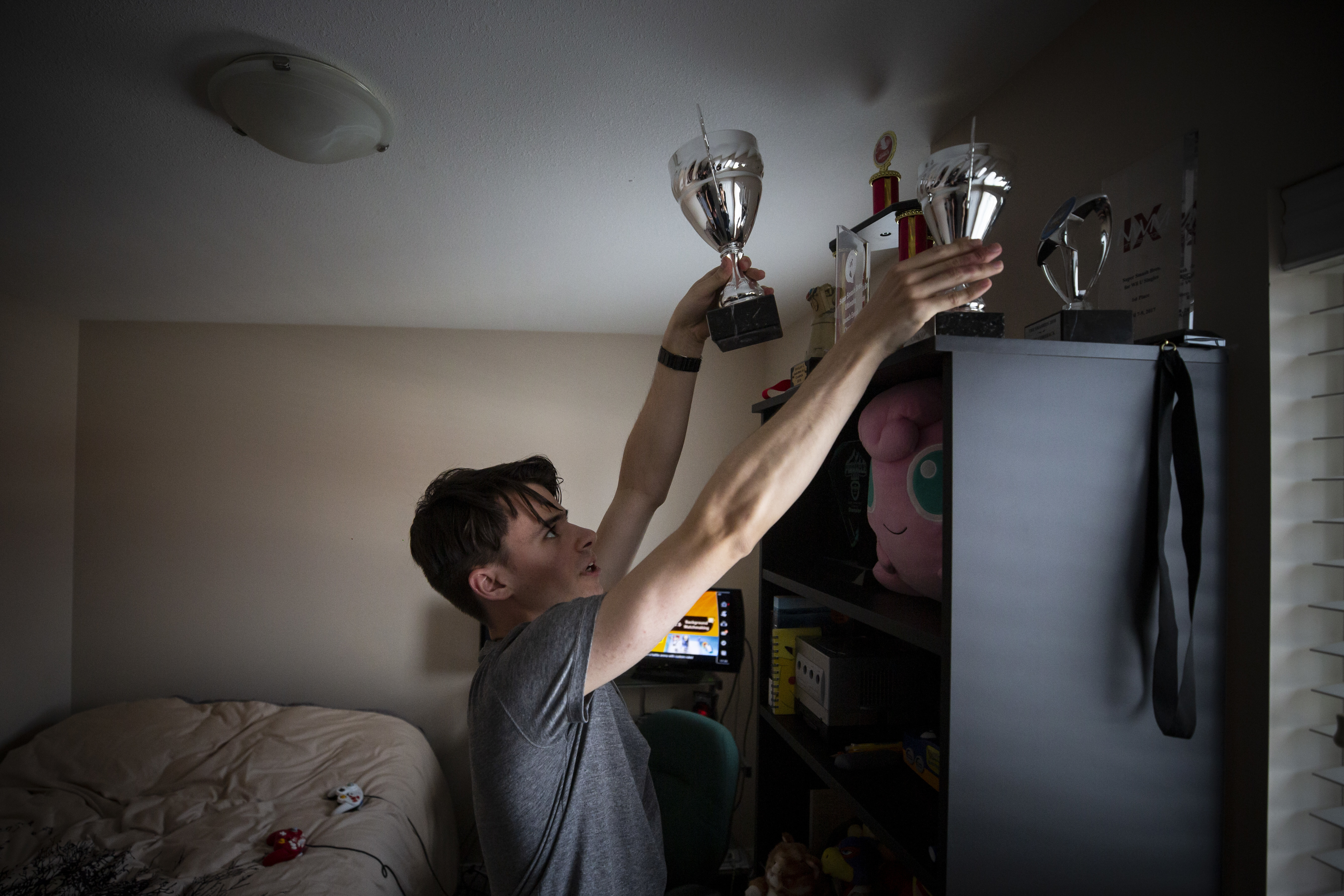 Landon Trybuch has taken home numerous trophies thanks to victories at international tournaments held throughout North America. He estimates he is on an airplane or long road trip at least every other weekend. (Ben Nelms/CBC)