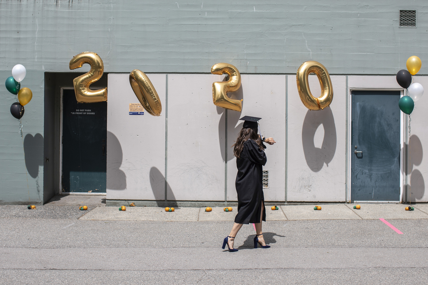 A high school grad during a socially distanced graduation ceremony at King George Secondary School in Vancouver on June 19, 2020. (Ben Nelms/CBC Vancouver)