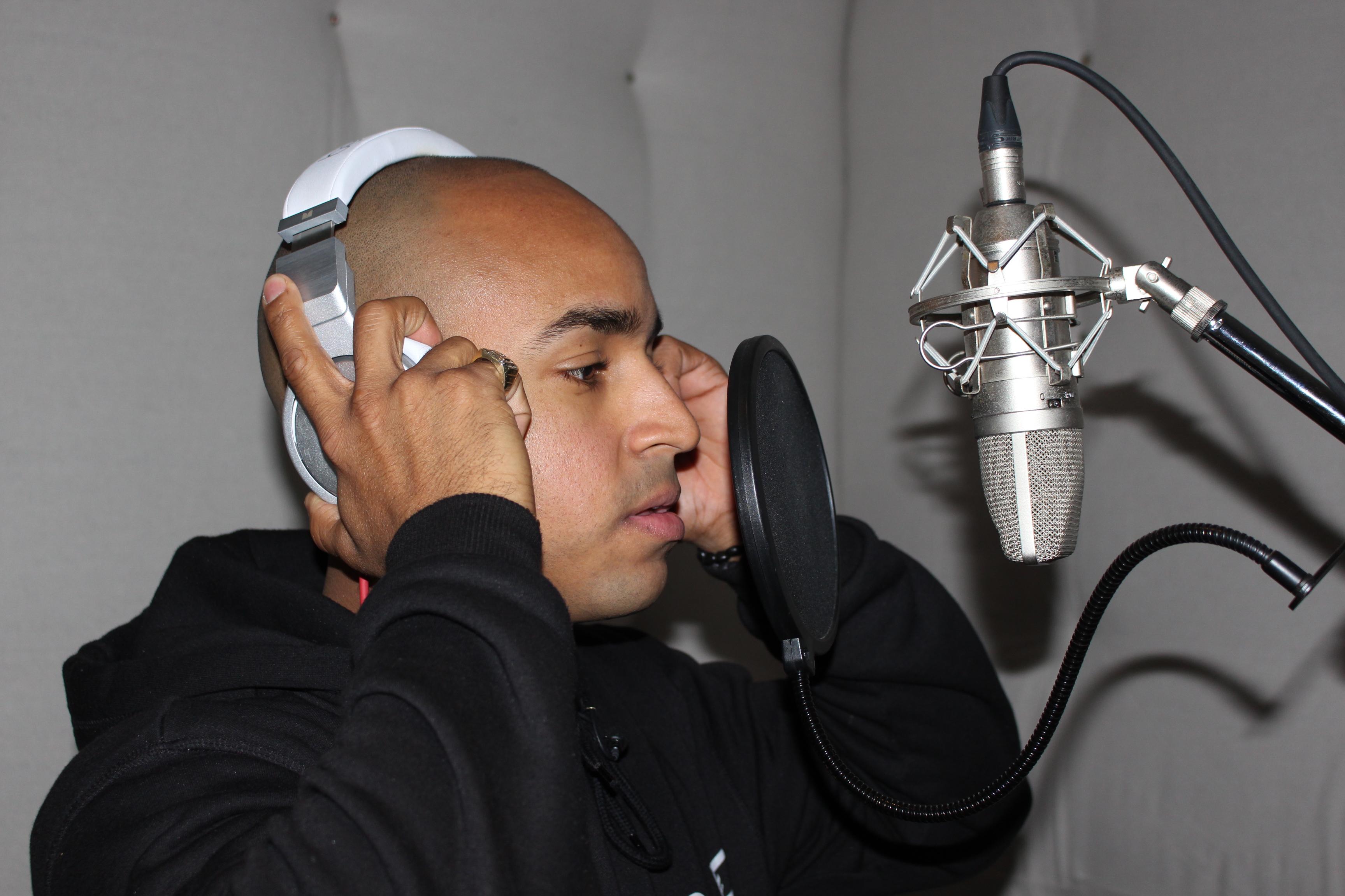 Holness performs at the TR1BE Studio.