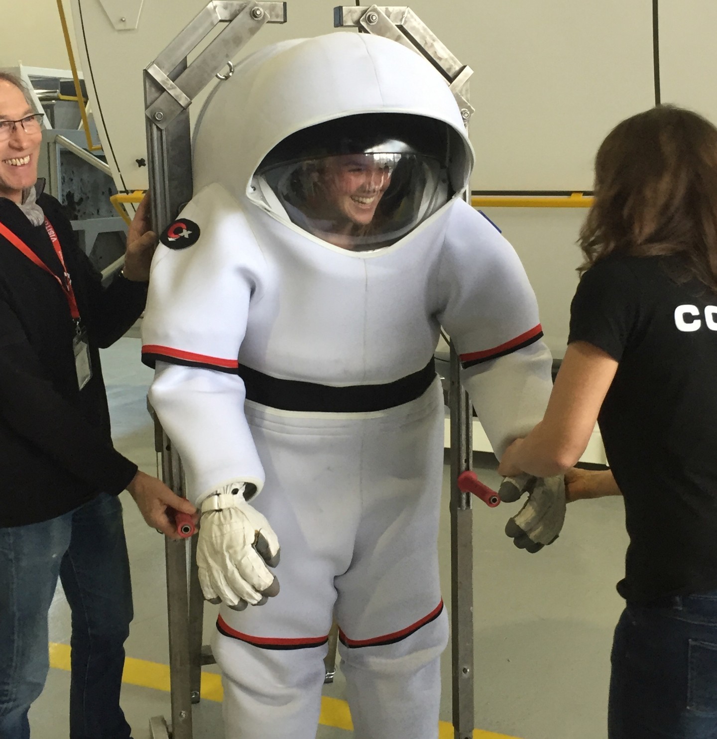 Katie Harris is outfitted with a diving suit at the European Astronaut Centre during Space Medicine Week earlier this year. (Submitted)