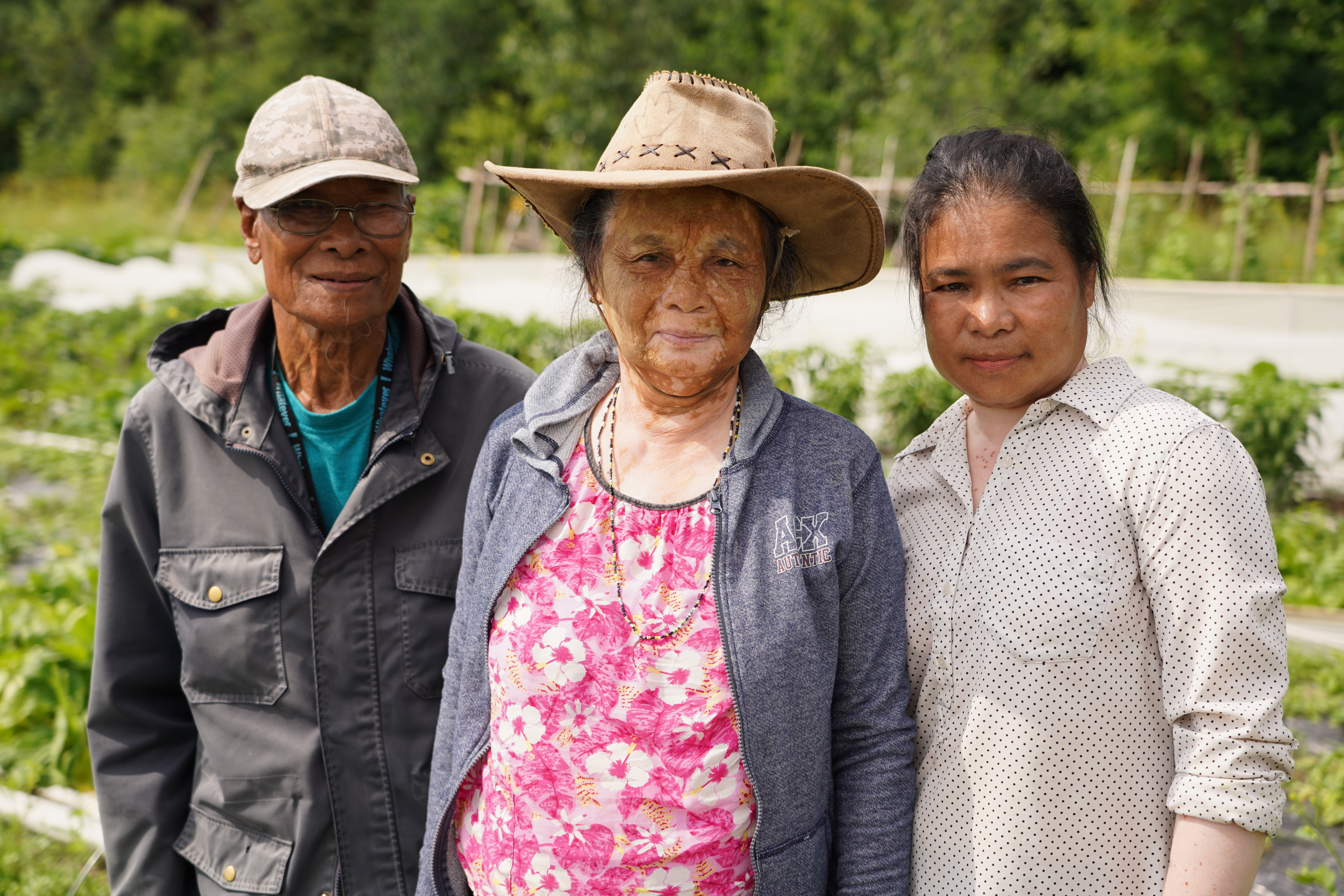 Kheela Naw, right, arrived in Canada in 2007. Her parents Mowry Dee and Yi Kwa came in 2012. (Francis Ferland/CBC)