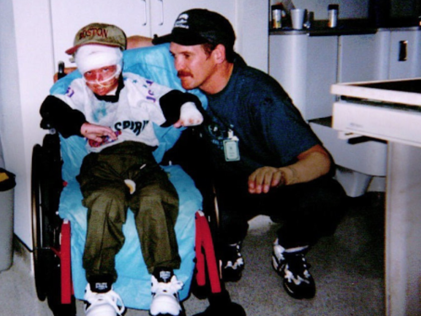 Kyle Hynes (left) with his dad, Patrick Hynes (right), at the burn centre in Boston. Hynes says his father is his hero. (Submitted by Kyle Hynes)