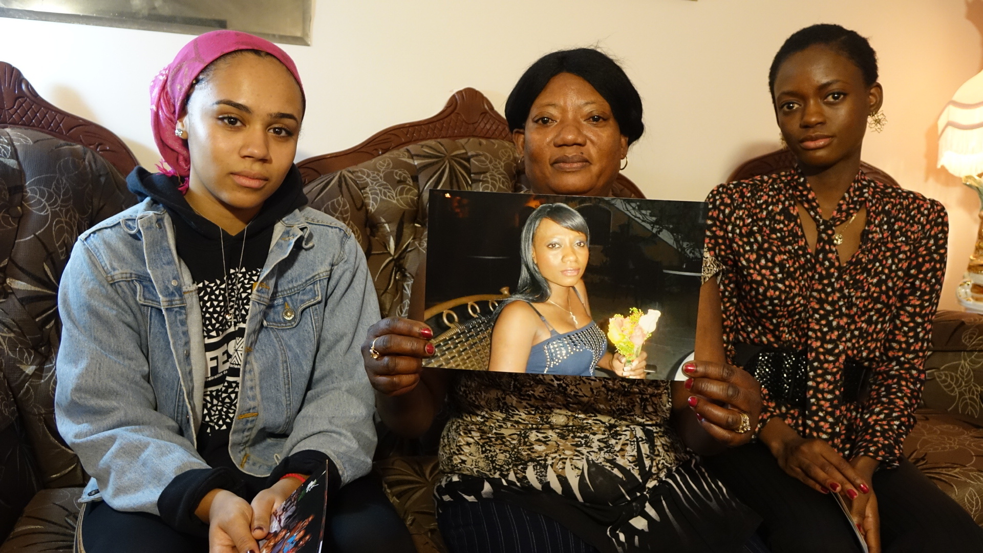 Fabiola's mother Marie-Pierre Philippe (centre) with her granddaughter Lydia (left) and daughter Marie-Oubline (right). (Jean Delisle/CBC)