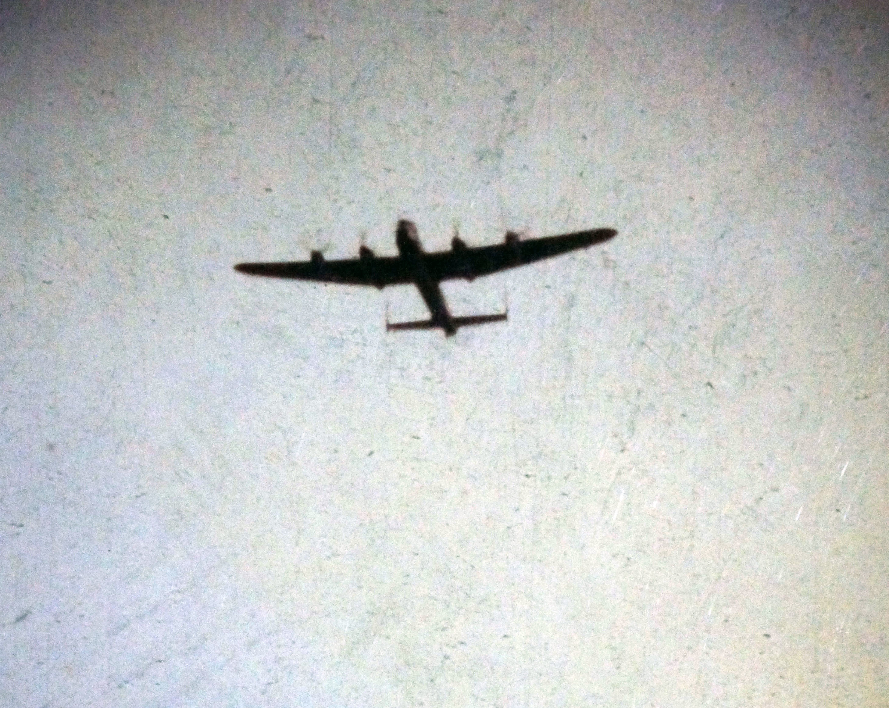 Lancaster 965 is shown in the air above the base at Alert just before the crash. (J Peter Johnson / Submitted by Richard Mayne / RCAF) 