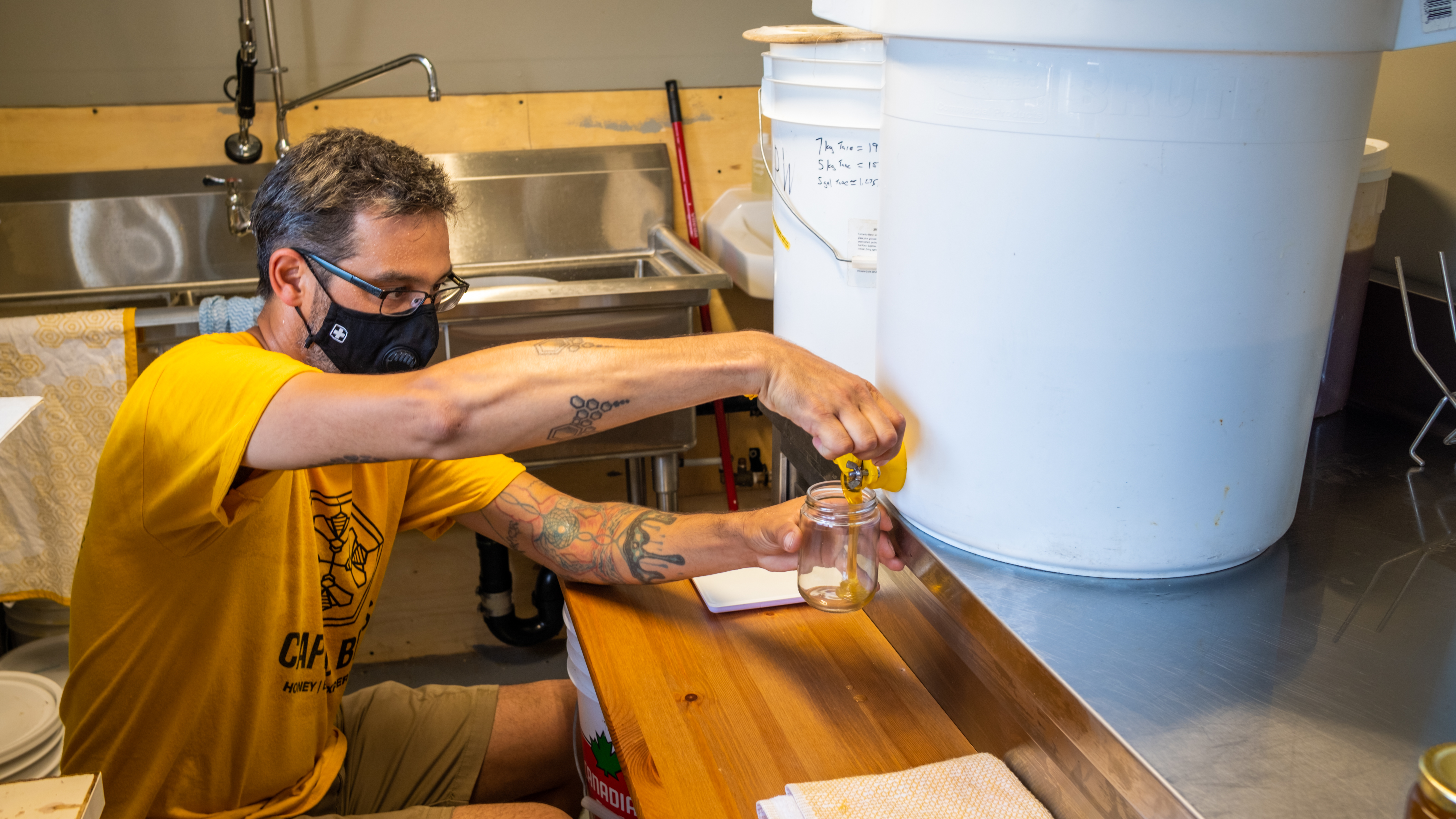 Inside Ron St Louis's new 'honey house.' (Michel Aspirot/CBC)