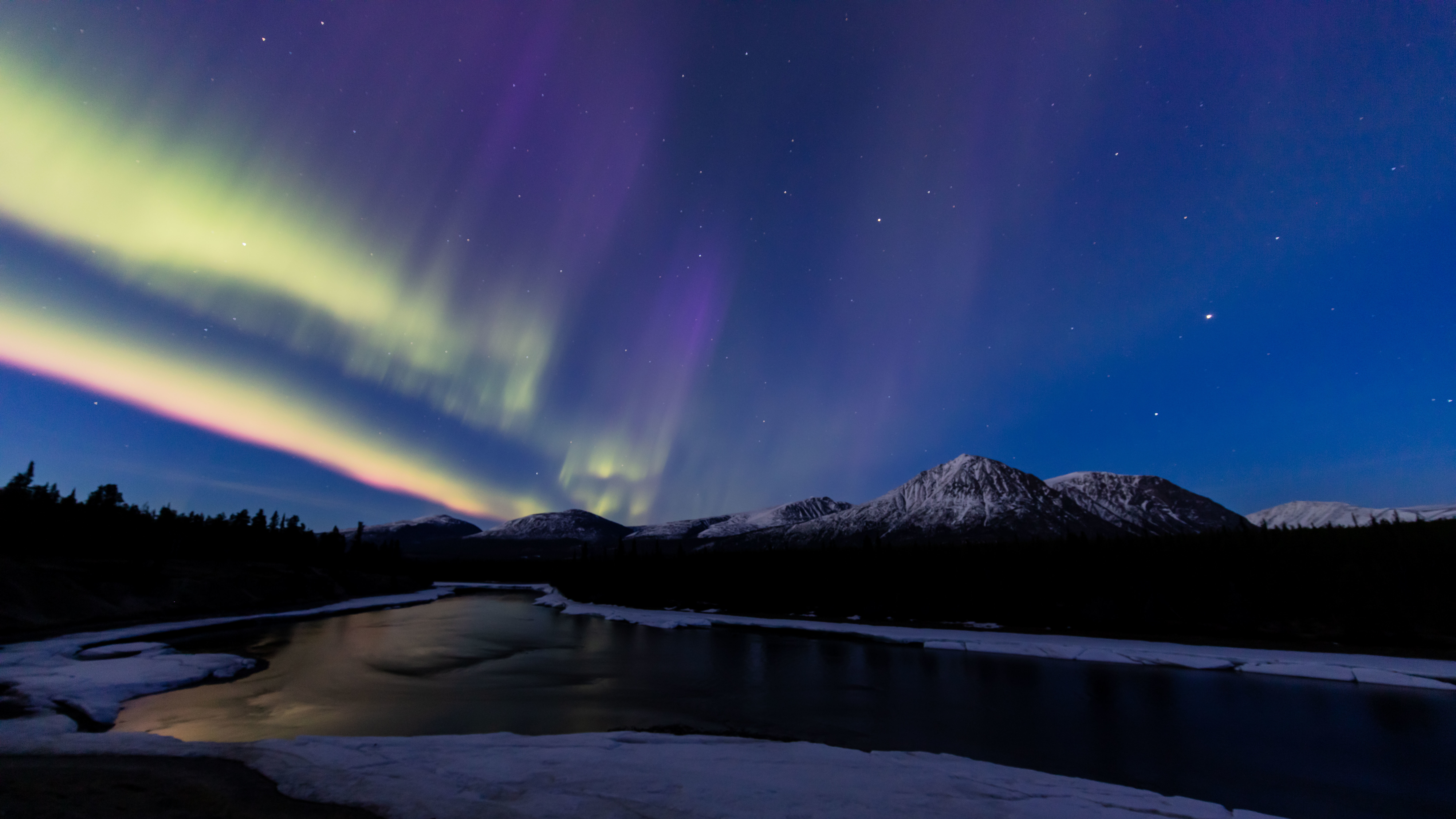 The aurora over the Takhini River Valley in Yukon. Sharon Shorty remembers watching those ribbons as a child with her grandmother in Teslin. (Mark Kelly)