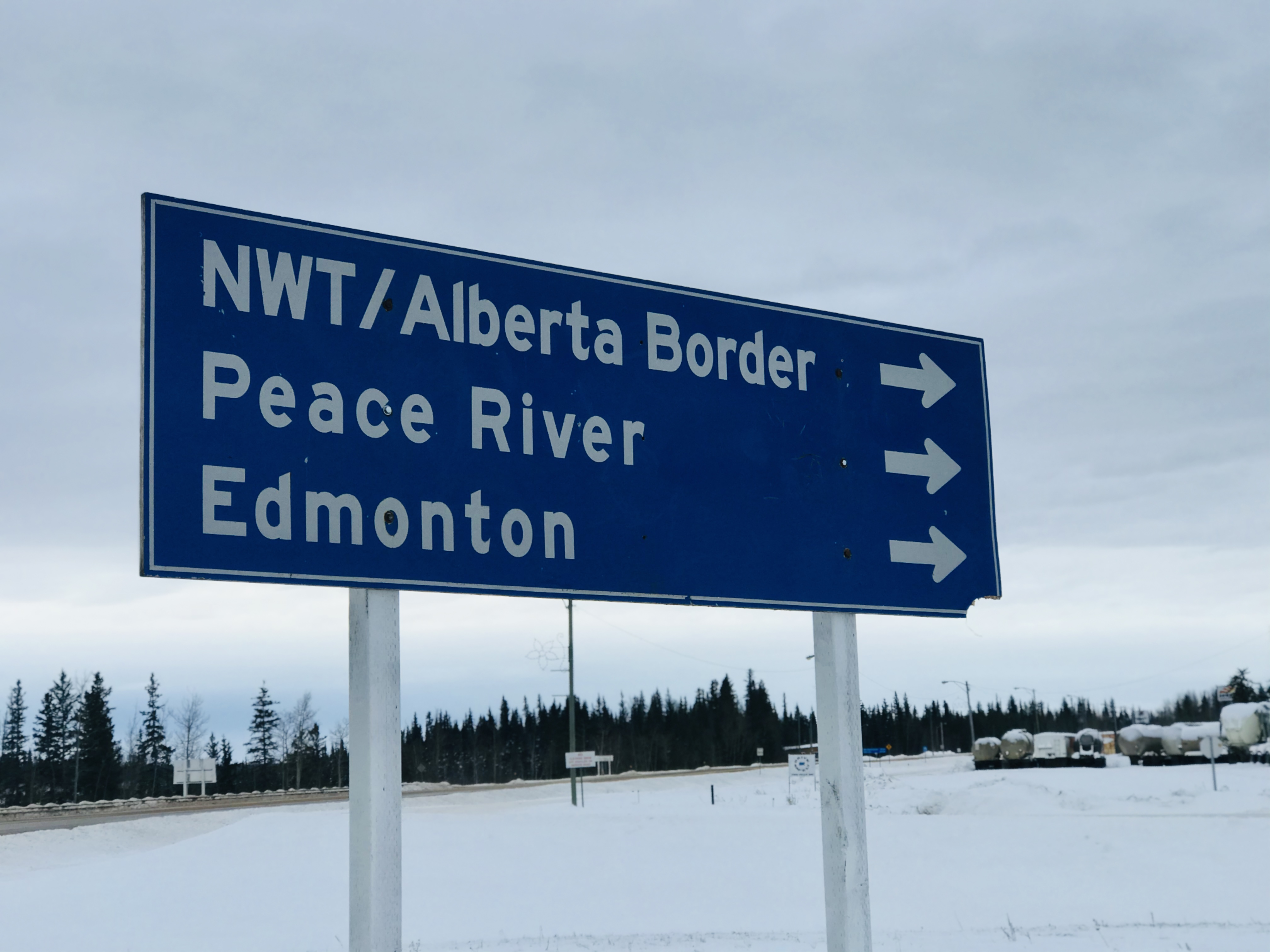 Shank and Feenstra, his business partner, each drive more than 120 kilometres to make the swap at the N.W.T.-Alberta border. (Anna Desmarais/CBC)