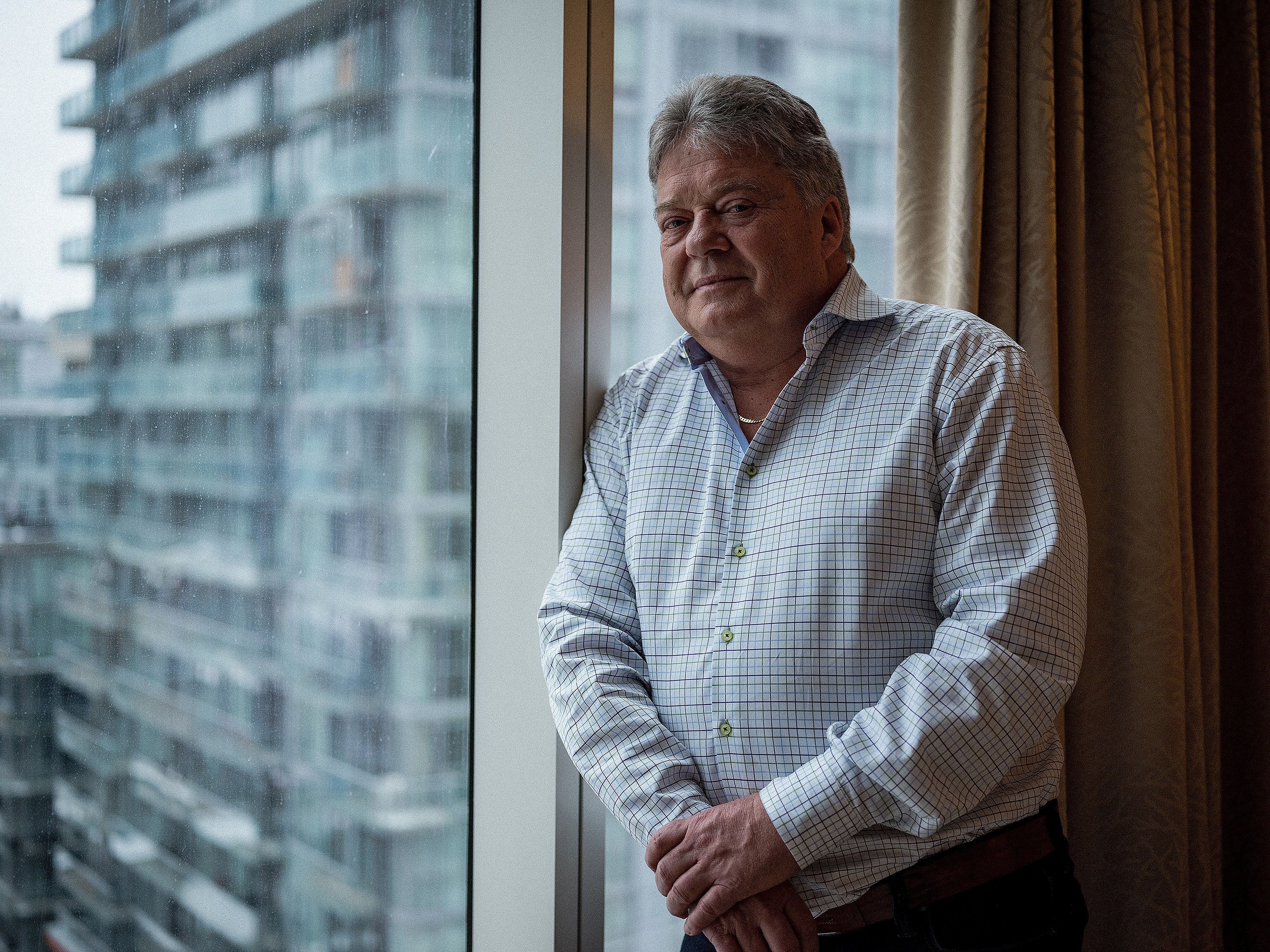 Vic Neufeld is the self-described ‘money man’ at the helm of Aphria, a Leamington, Ont.-based medical marijuana business. Neufeld, who grew up not far from Aphria’s massive greenhouses, rose to prominence as the CEO of Canadian vitamin giant Jamieson. (Evan Mitsui/CBC)