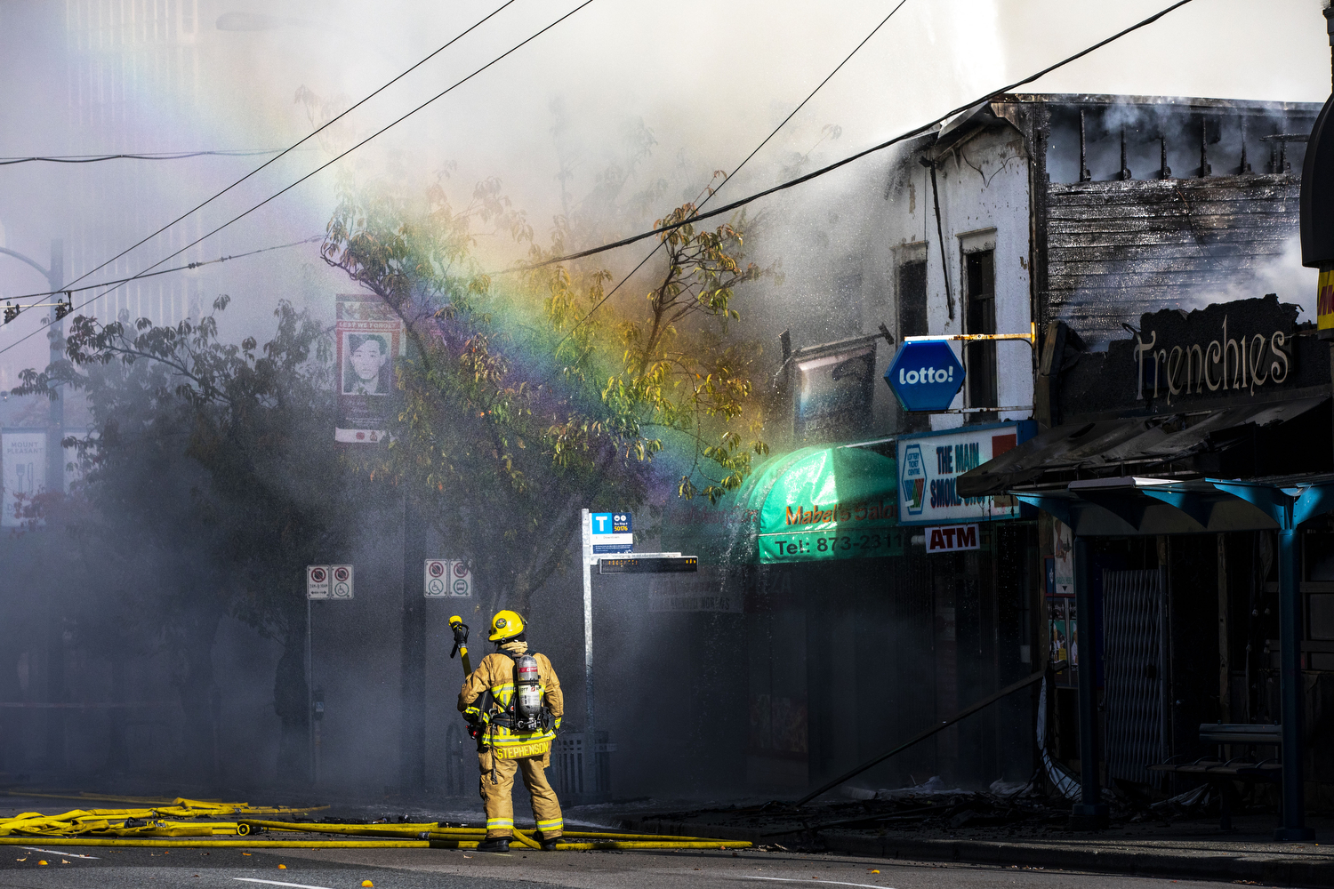 Vancouver fire crews work to contain a fire in the 2400 block of Main Street in Vancouver on Oct. 22, 2020. (Ben Nelms/CBC Vancouver)