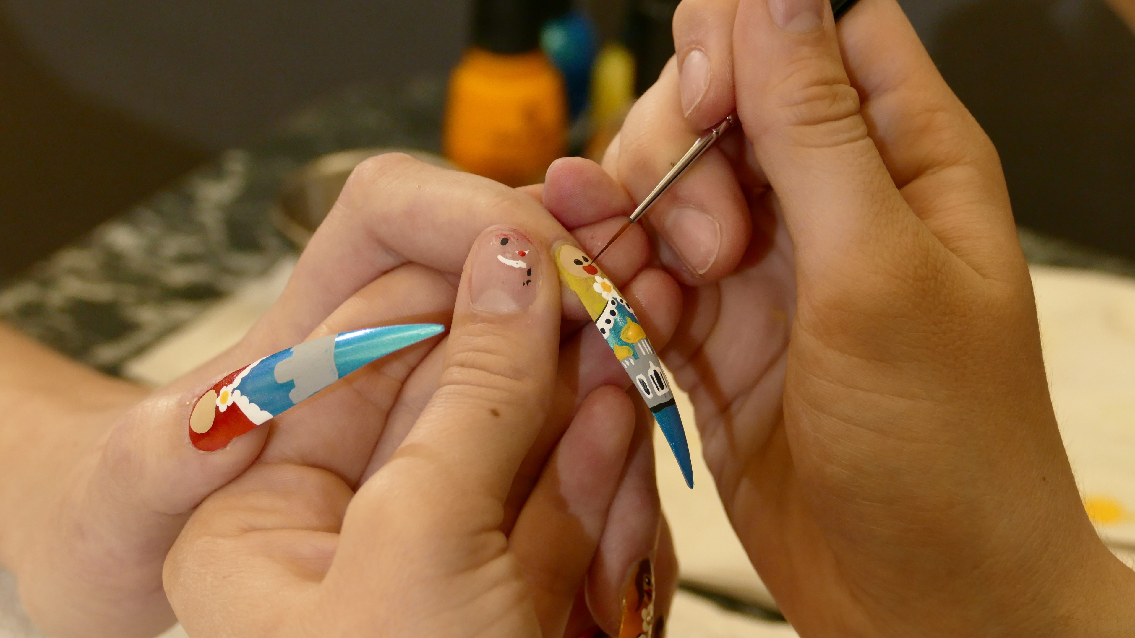 A close up of Klippenstein's nail art.