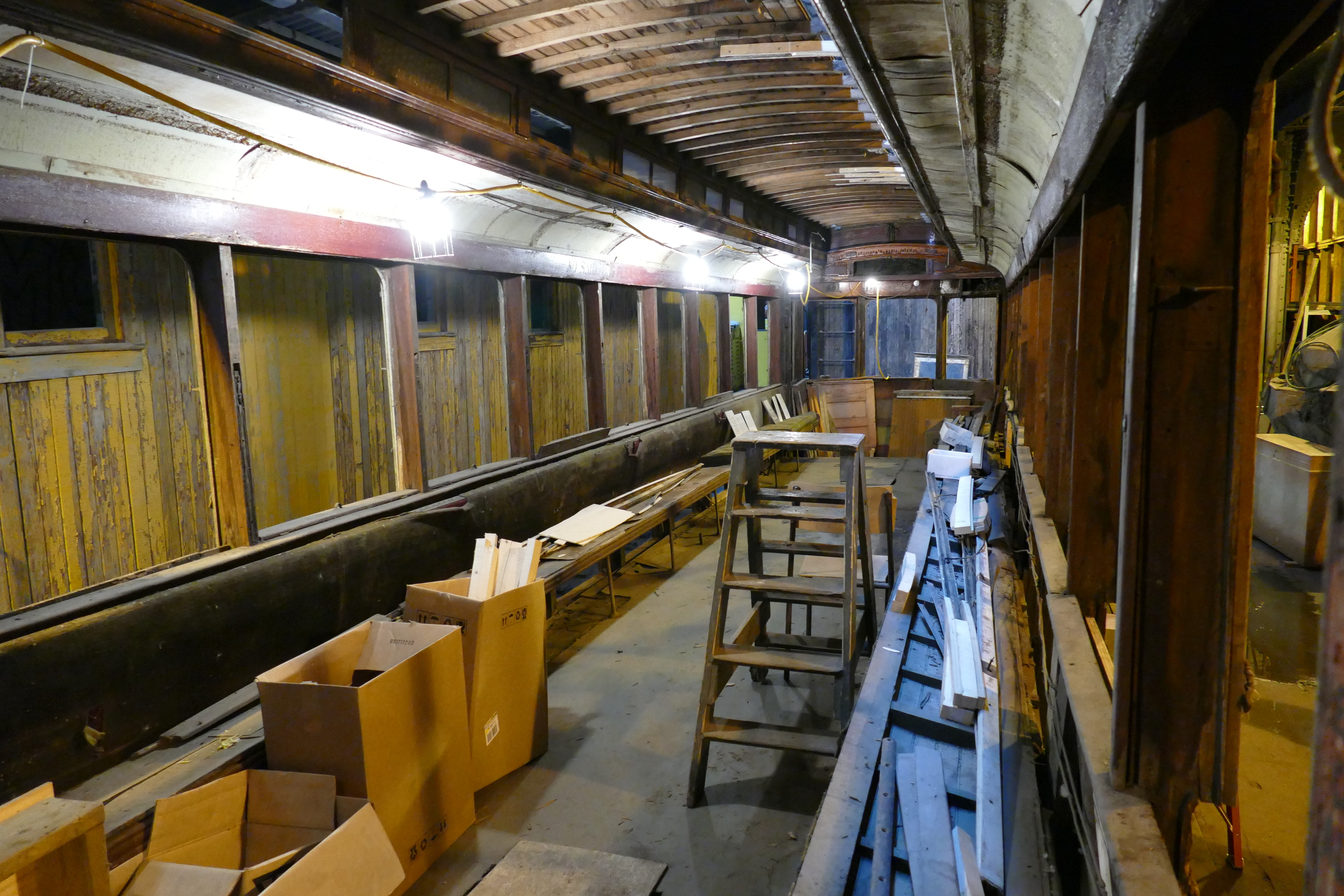 Two long wooden benches line the inside of the streetcar. (Jeff Stapleton/CBC)