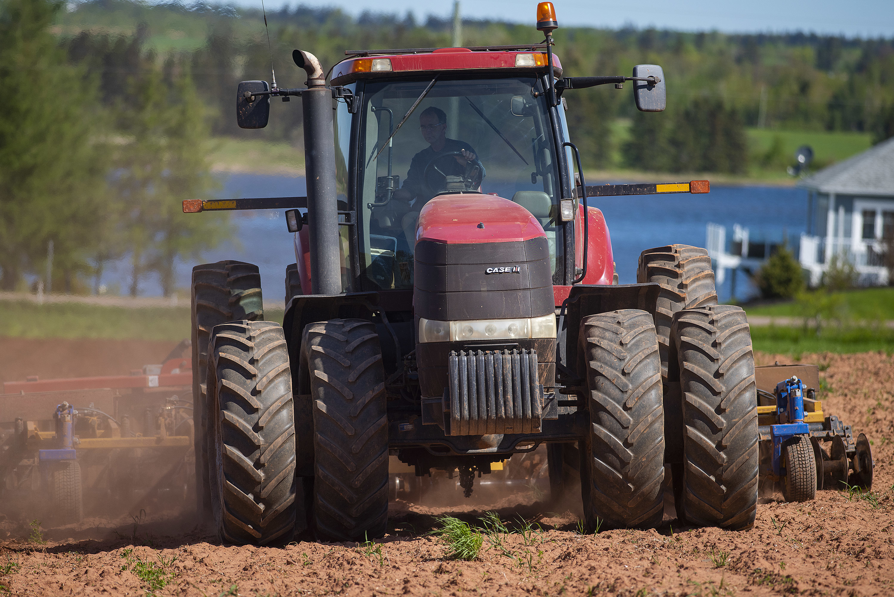 These days farming is big business and machines like this one can cost much more than $100,000. (Brian McInnis)