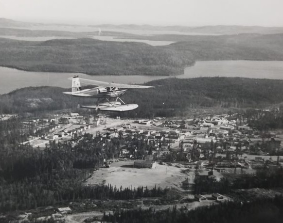 A Cessna 180 float plane over La Ronge, Sask., circa. 1957.This plane is the same make and model as the plane that crashed in 1959.