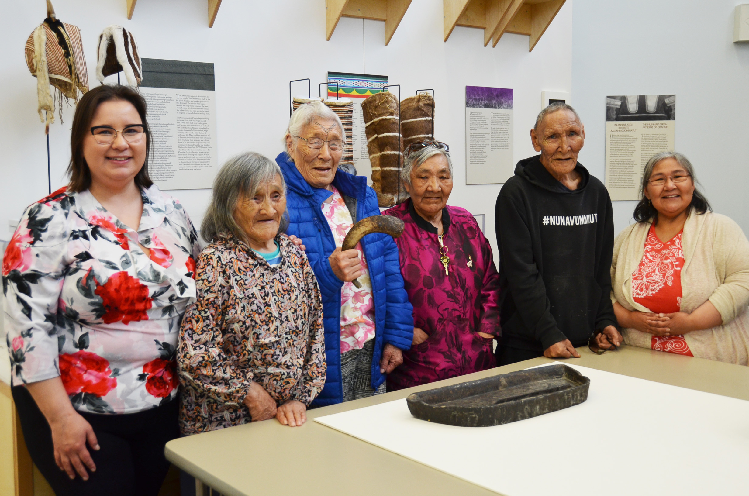 Pam Gross, left, poses for a photo with a group of elders at the May Hakongak Cultural Centre. Elders in residence at the centre sew traditional garments a few days a week, encouraging youth to drop by. (Pitquhirnikkut Ilihautiniq/Kitikmeot Heritage Society)