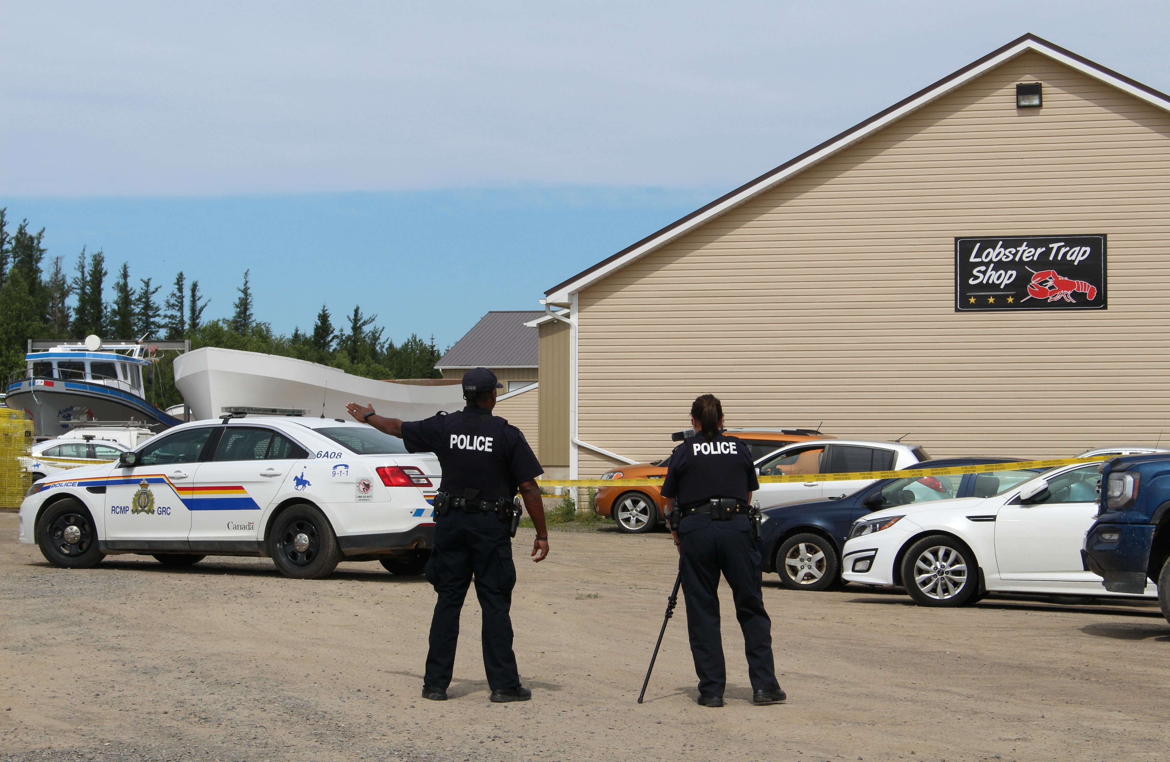 RCMP, shown at DJ Marine on July 25 last year, will only say a 30-year-old woman was shot and killed by a 42-year-old man, who then took his own life. (Shane Magee/CBC)