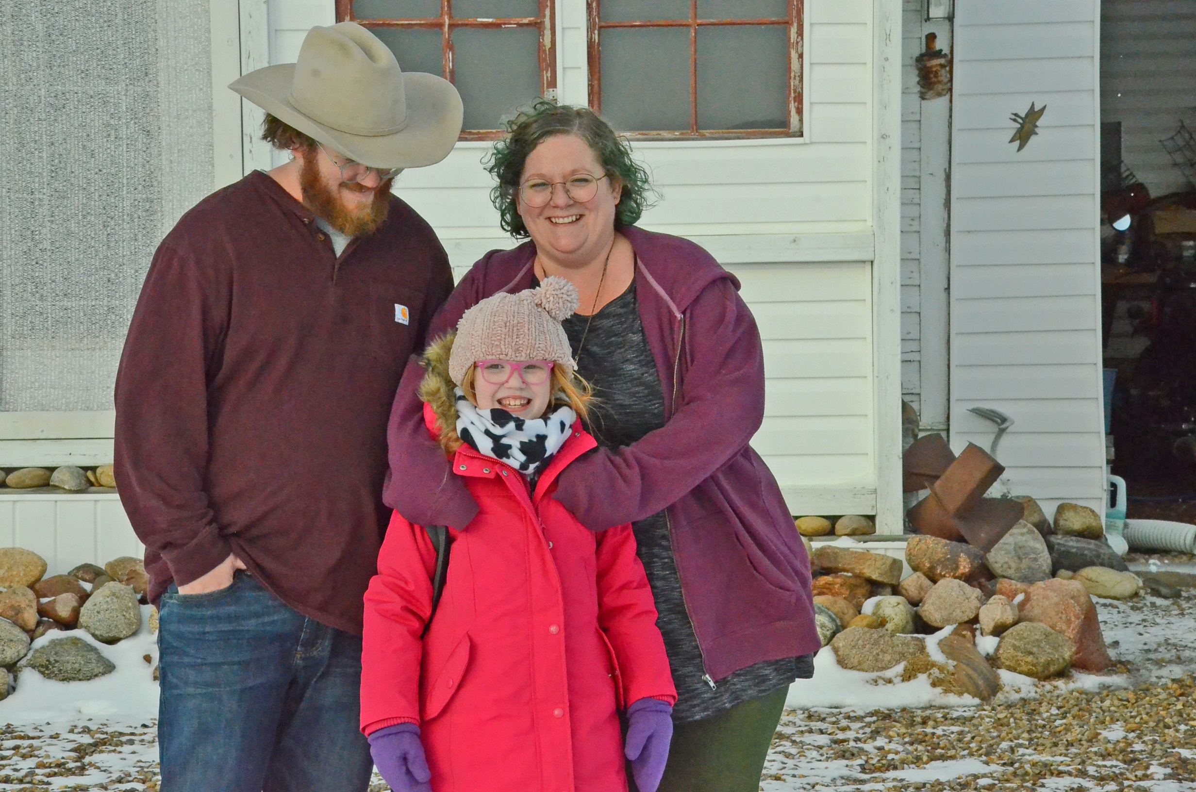 Brad and Colleen Proudlove, and their daughter, Neko, moved to a church near the U.S. border last year. (Bridget Yard/CBC)